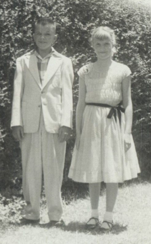 My cousin Jerry and I in 1954 ... I am wearing the pale aqua smocked Easter dress that I loved so much, complete with Easter shoes ... I was eleven years old