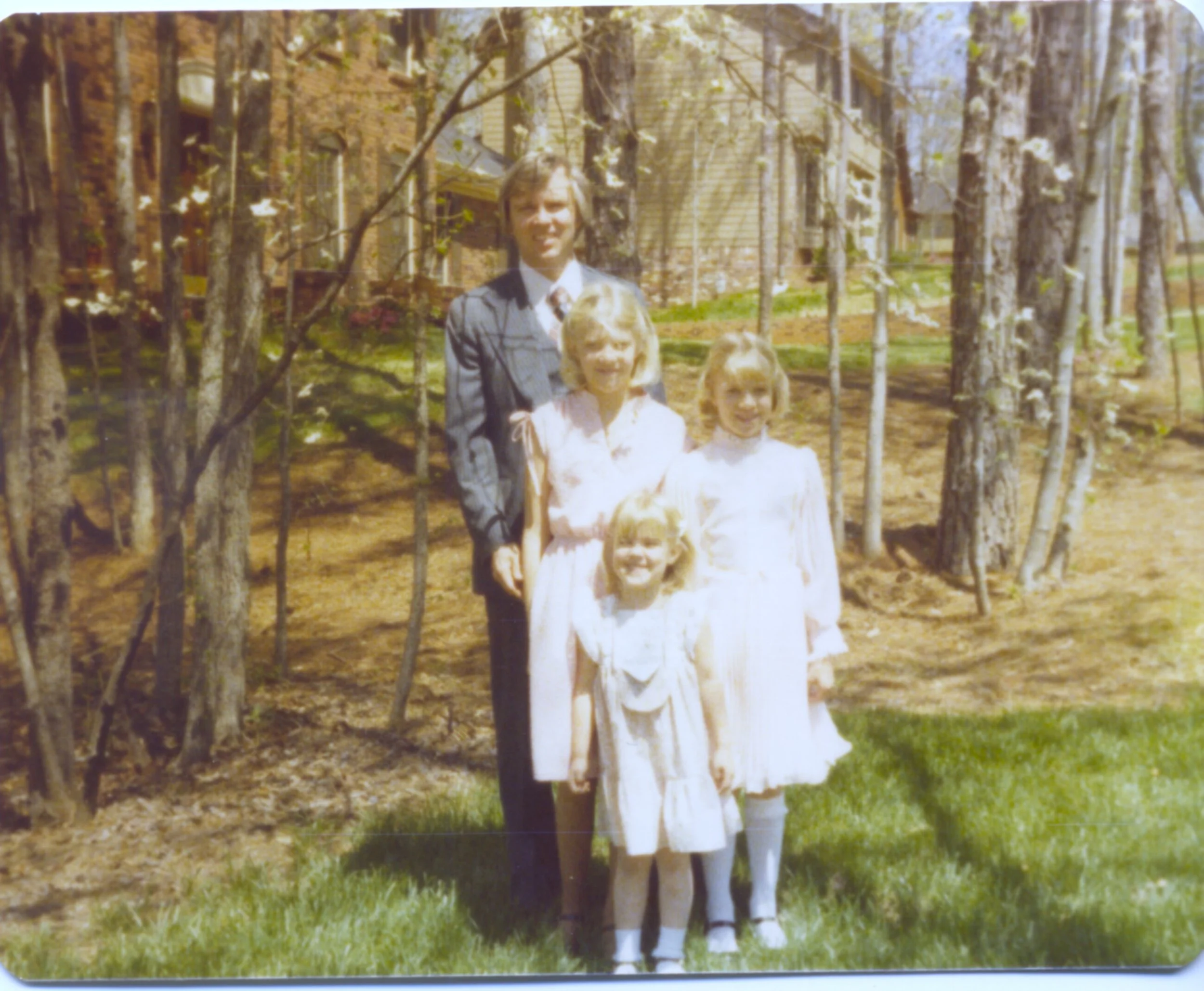 Our three daughters Lisa, Laurie, and Debra with their dad ... Hearthstone Circle, Easter 1979