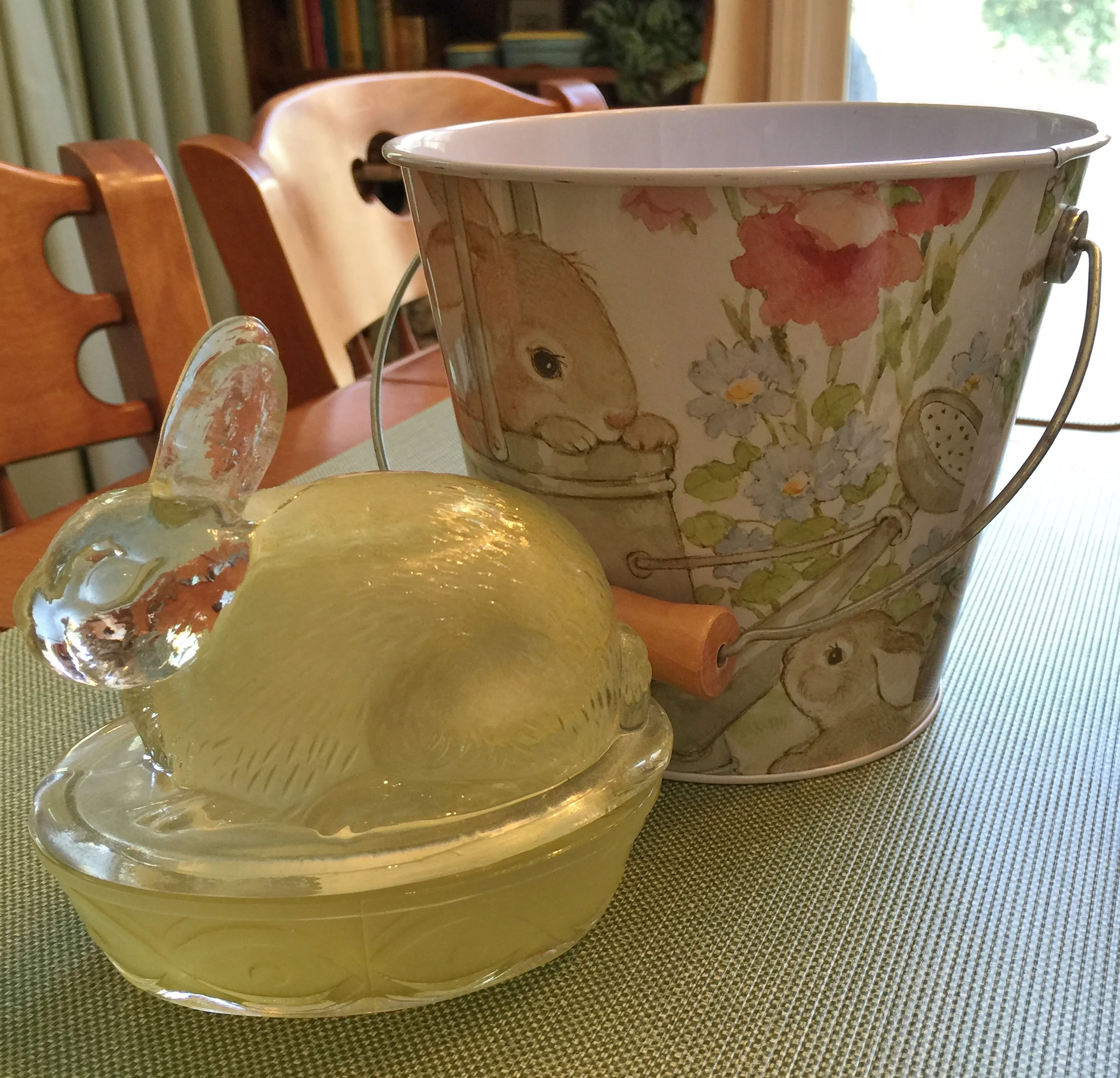 A really cute tin bucket that I found about ten years ago and a yellow bunny dish