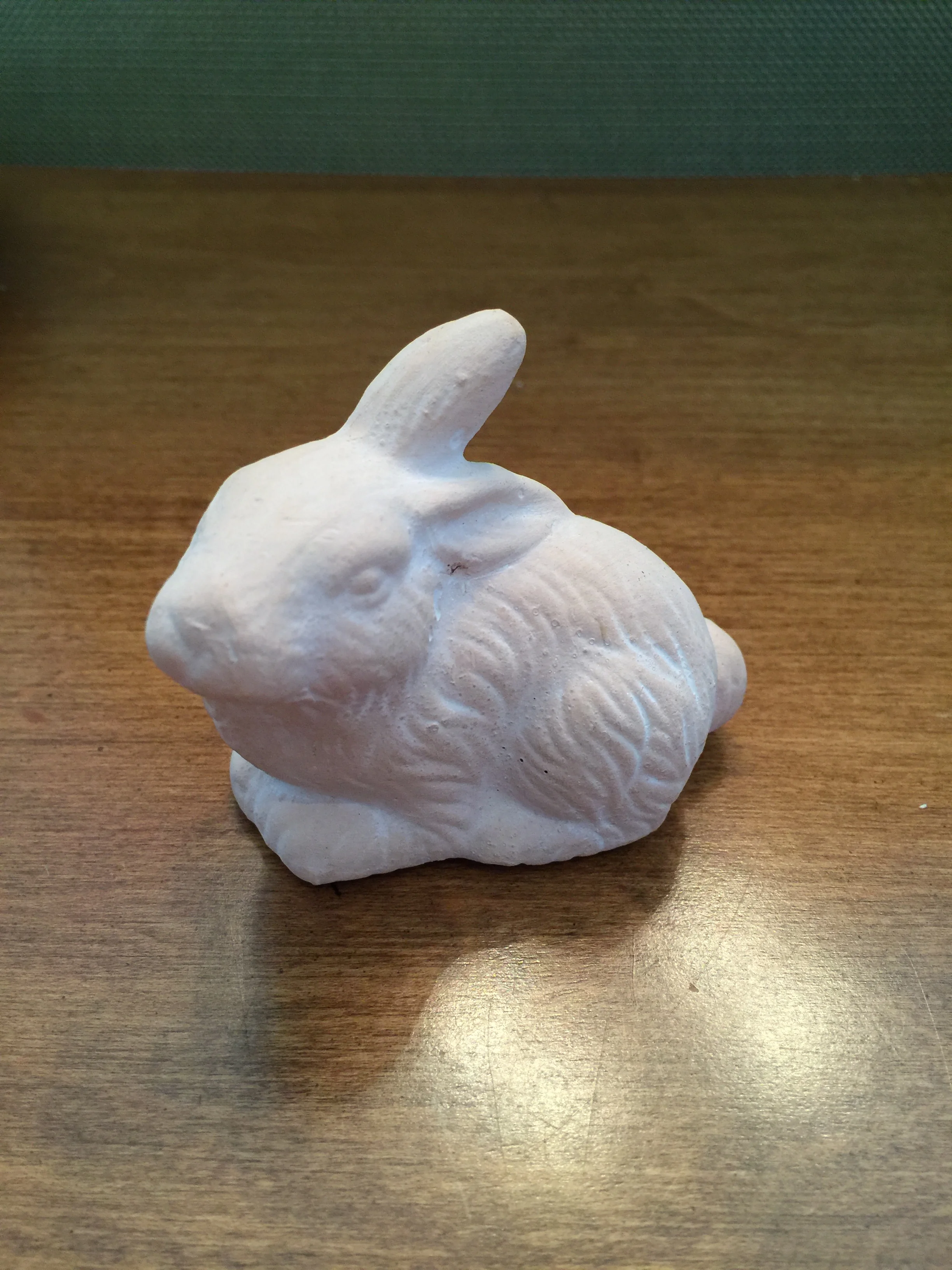 A small terracotta bunny
