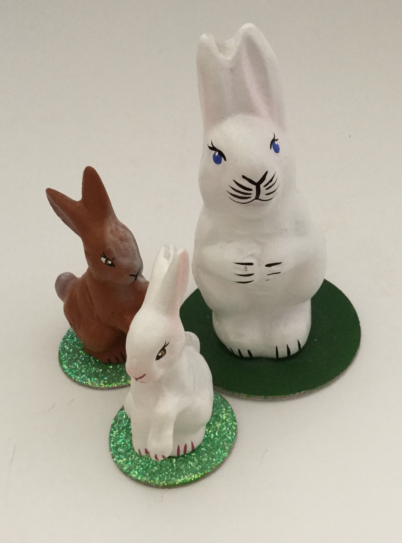 Three little chalk-ware bunnies