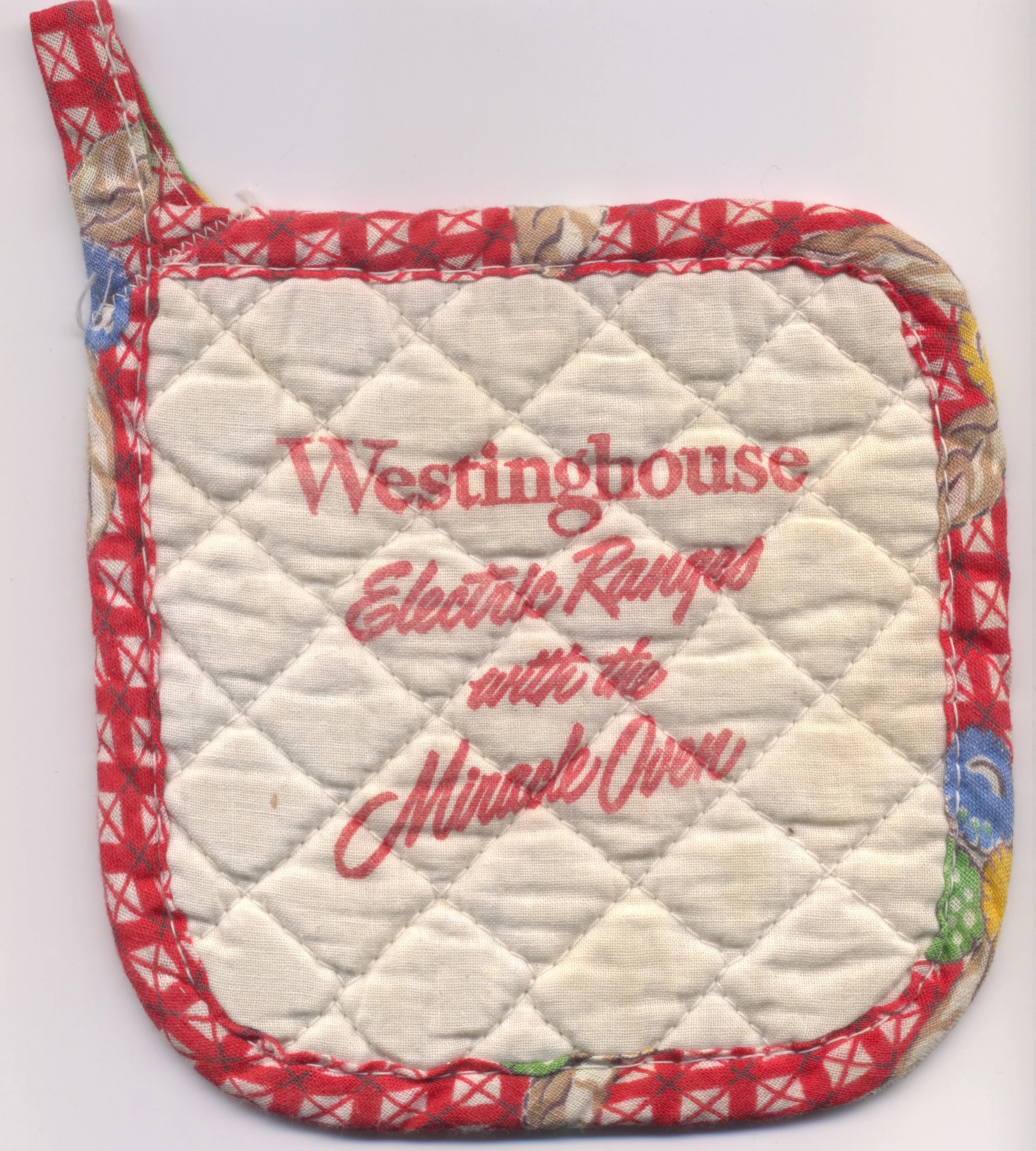 A fun collectible pot holder that no doubt came with a new Westinghouse electric range