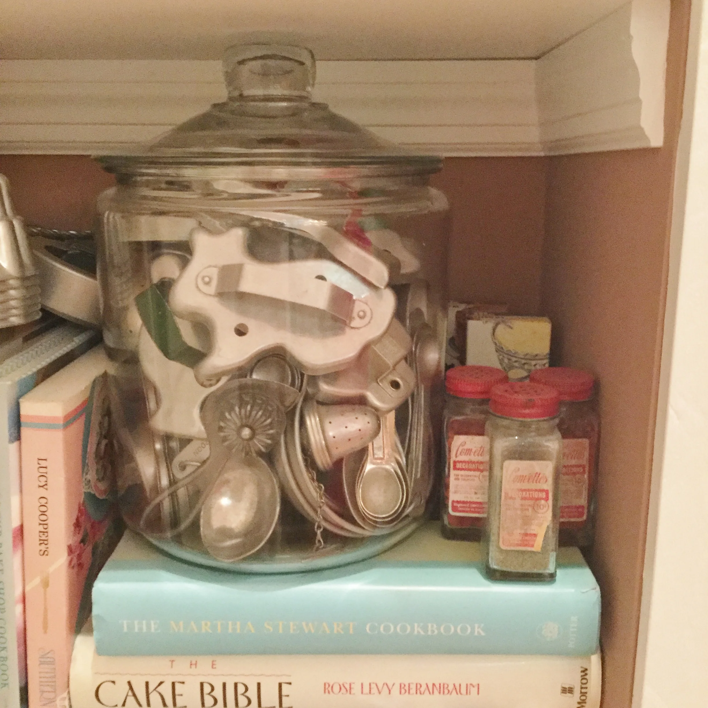One of my jars of collected cookie cutters ... kitchen art to me and I love to see them everyday.