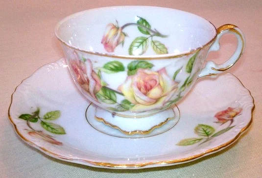 This cup and saucer was given to me by my aunt ... it had belonged to her mother-in-law. UCAGCO China cup and saucer made in Japan ... United China and Glass Company (UCAGCO) was based in the USA and was the distributor of many Japanese china patterns during the early 1950s.