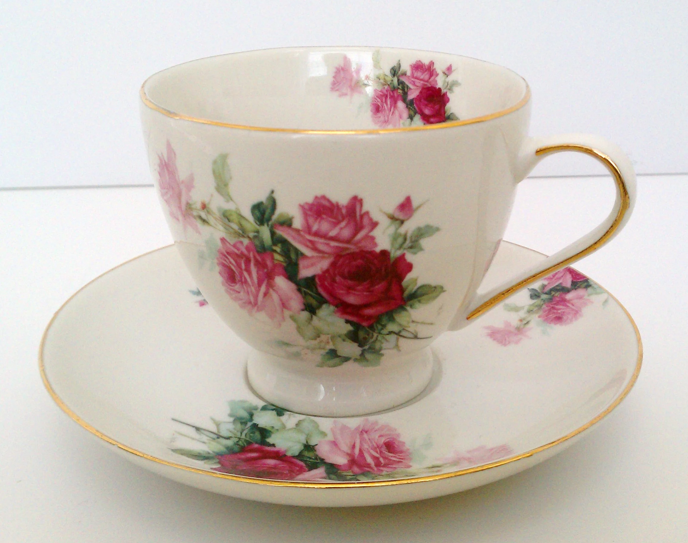 Pretty unmarked rose cup and saucer