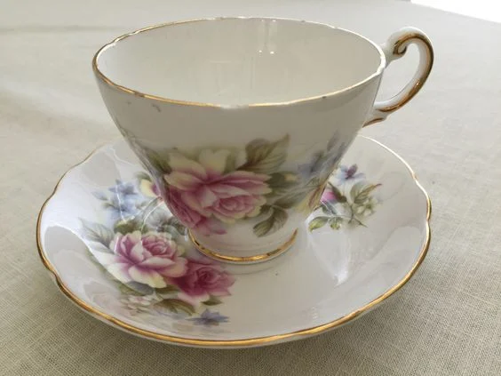 Pink roses cup and saucer ... Regency bone china made in England
