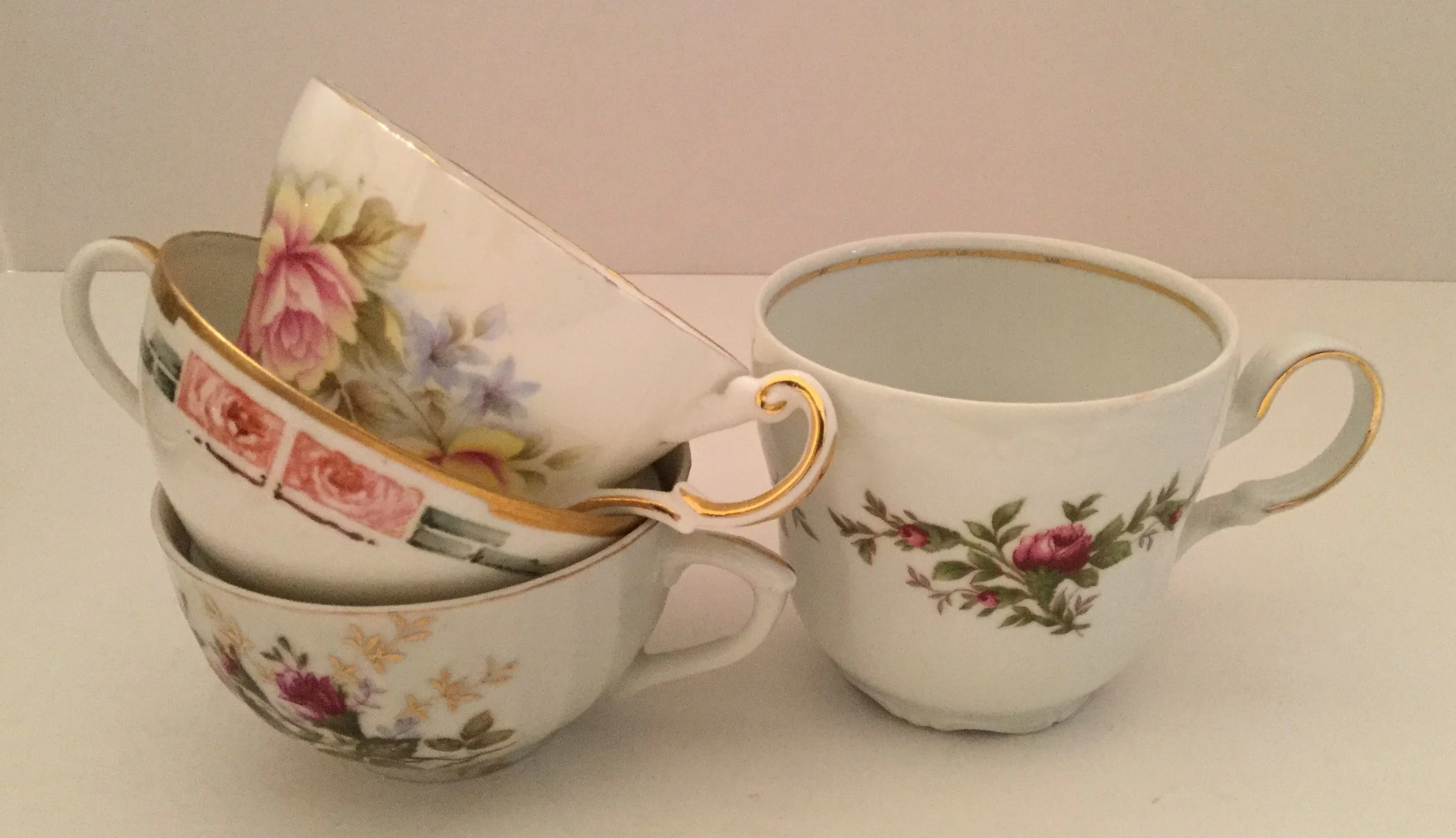 Orphan cups ... large cup on the right is Traditions Fine China by Johann Haviland China Corporation