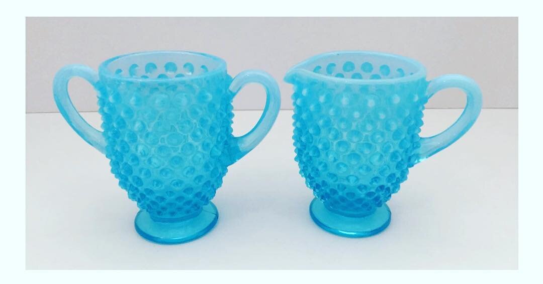 Fenton blue hobnail cream and sugar that belonged to my mother in the 1940s 
#alwaysacollector #fenton #hobnail #antiquesugarbowl #antiquecreamer #vintagecreamandsugar #collections #handeddown #mymothers