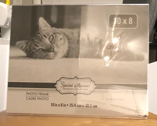 Black Plexiglass (about $10 on Amazon) or A photo frame! Really, you just need a reflective surface that you can lay something black under. You should be able to lay it flat. The bigger the better. However, for smaller products (such as cosmetics) a…