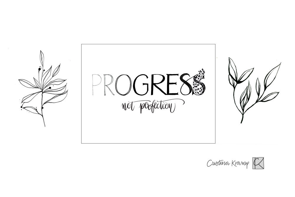 PROGRESS. The word itself delineates the meaning (going from simple to elaborate), surrounded by  laurel branches representing victory.