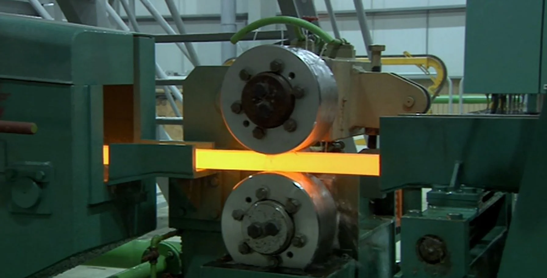 Cast bar exiting Hazelett copper bar caster