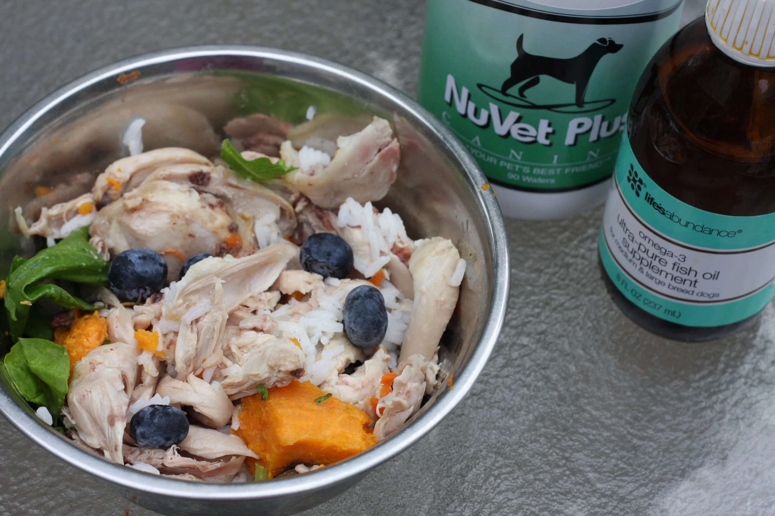 Chicken, Rice, Spinach, Sweet Potato and a few Blueberries. One NuVet Plus a day and a few drops of Life's Abundance Fish Oil for Omega-3. We will be a supplier of both NuVet and Life's Abundance products in a few months! Stay tuned for any of your pet needs.