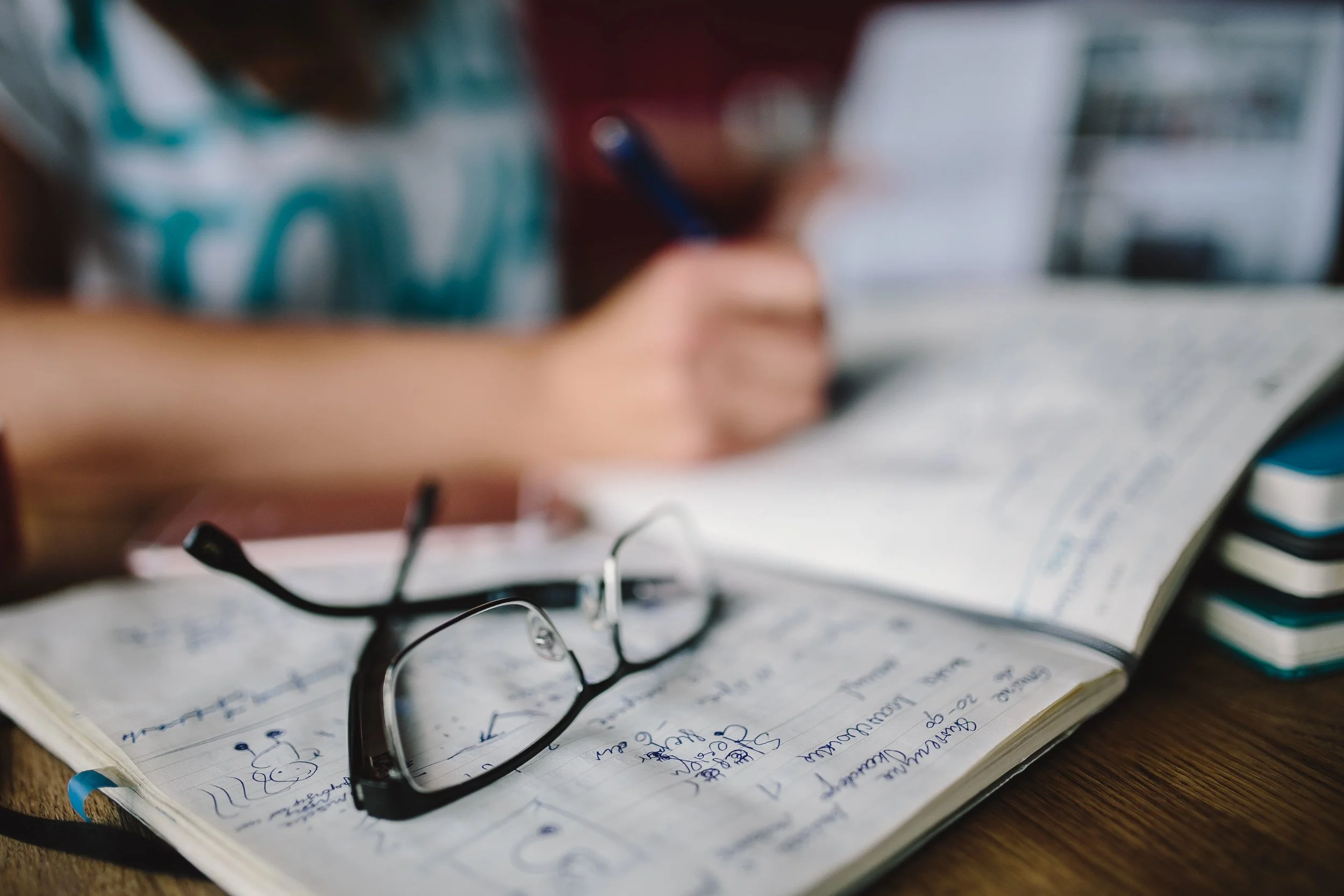 kaboompics_Woman writing in her notebook.jpg