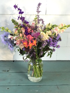 mixed bouquet in mason jar