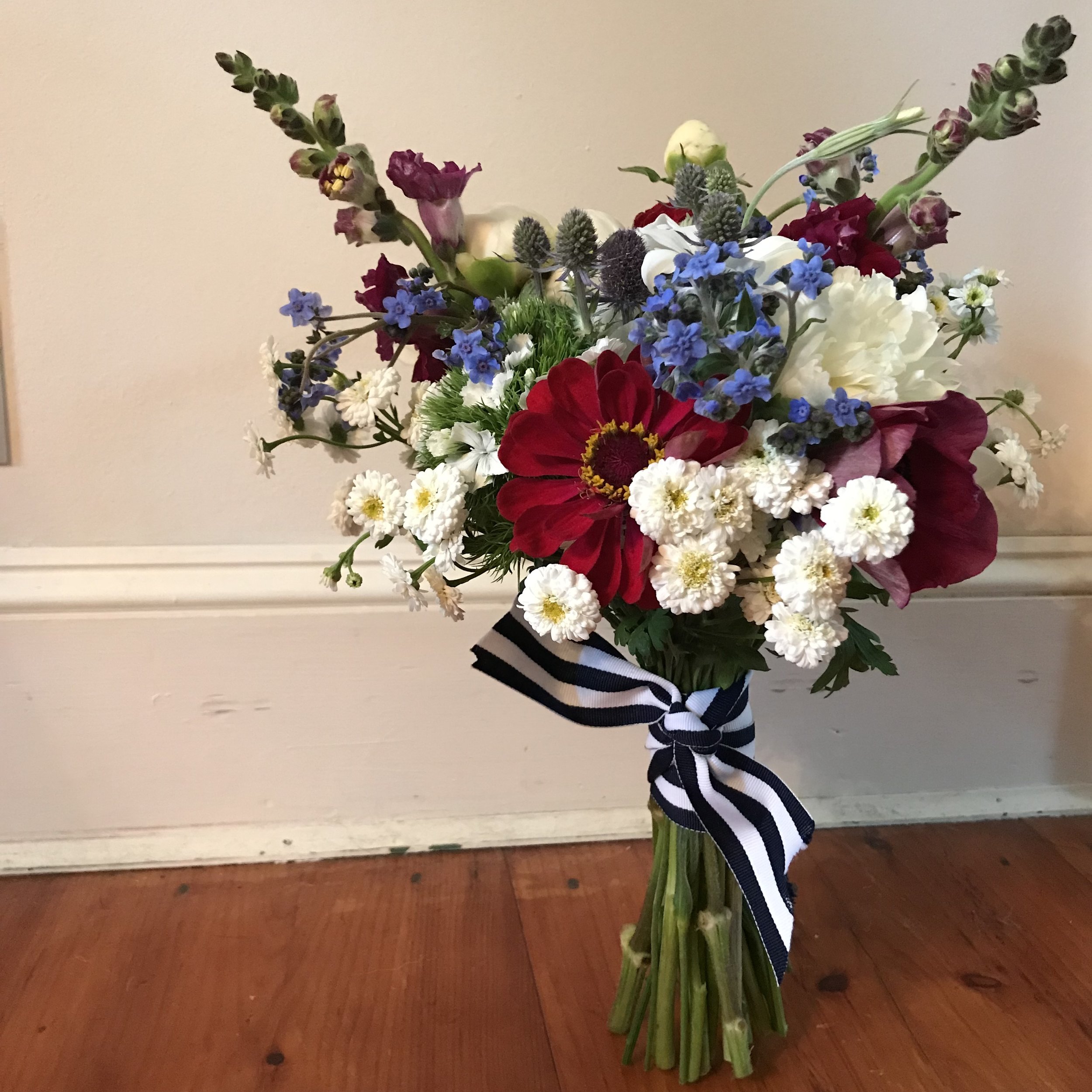 red, white and blue bridal bouquet