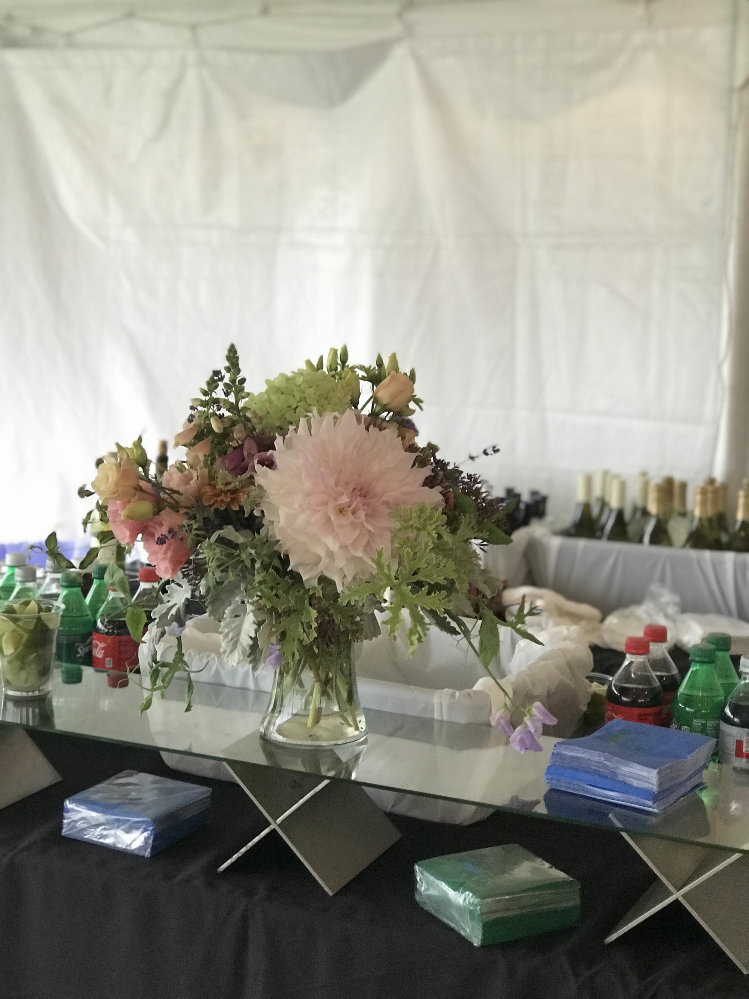 large freestanding arrangement featuring cafe au lait dahlias