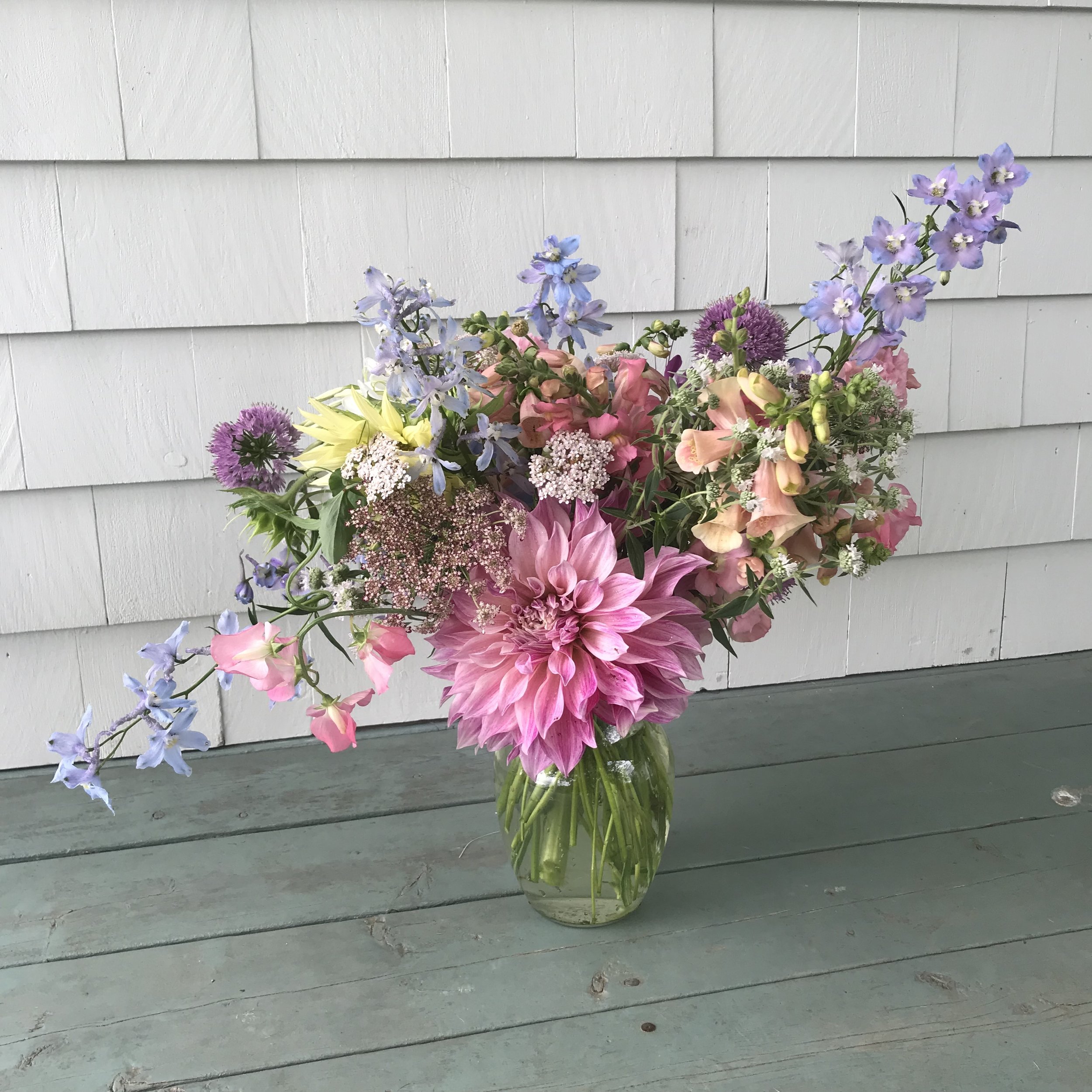 pastel vase arrangement featuring cafe au lait dahlia