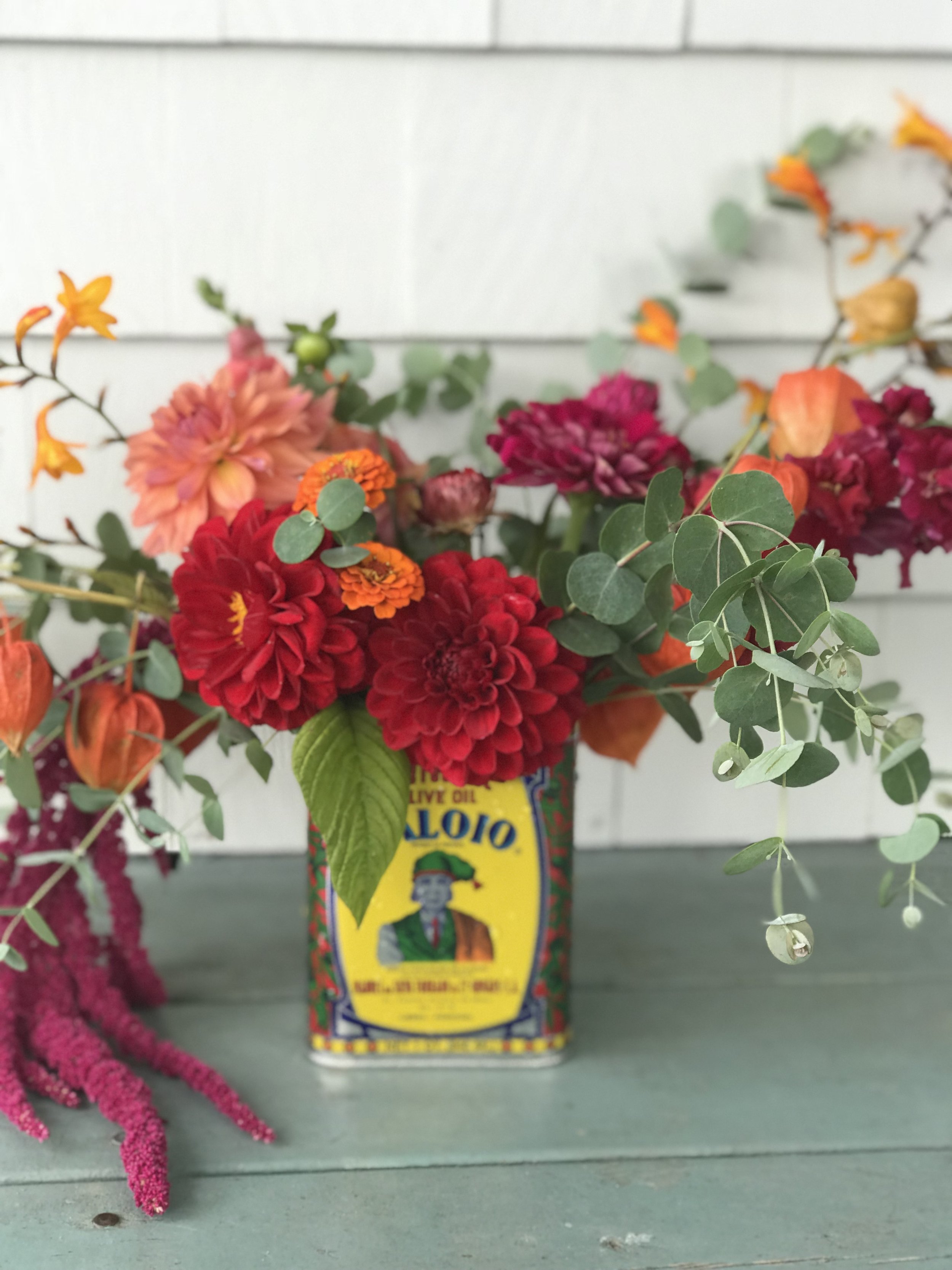 late fall vase arrangement in vintage can