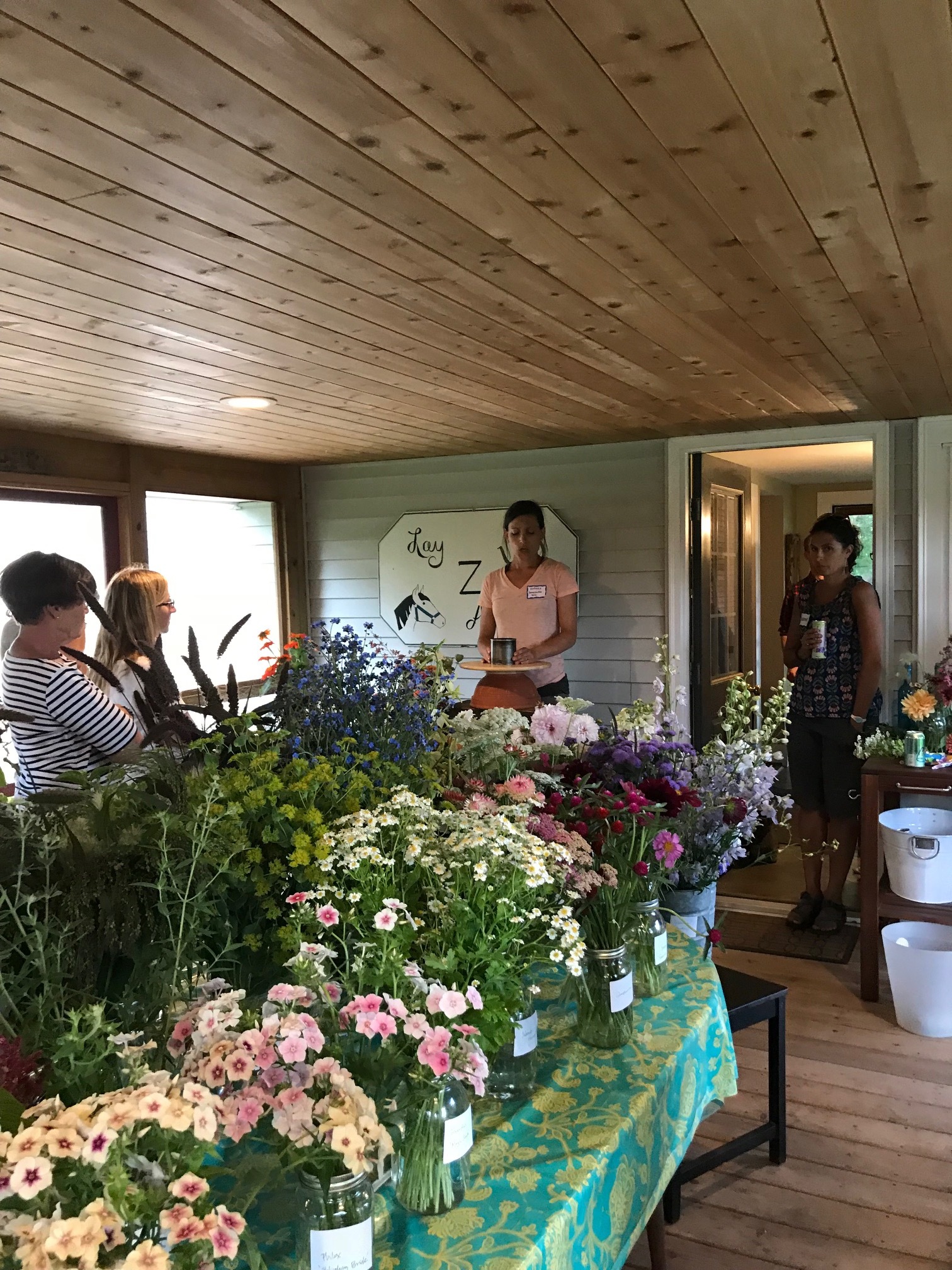 flowers await students on the back porch during a workshop