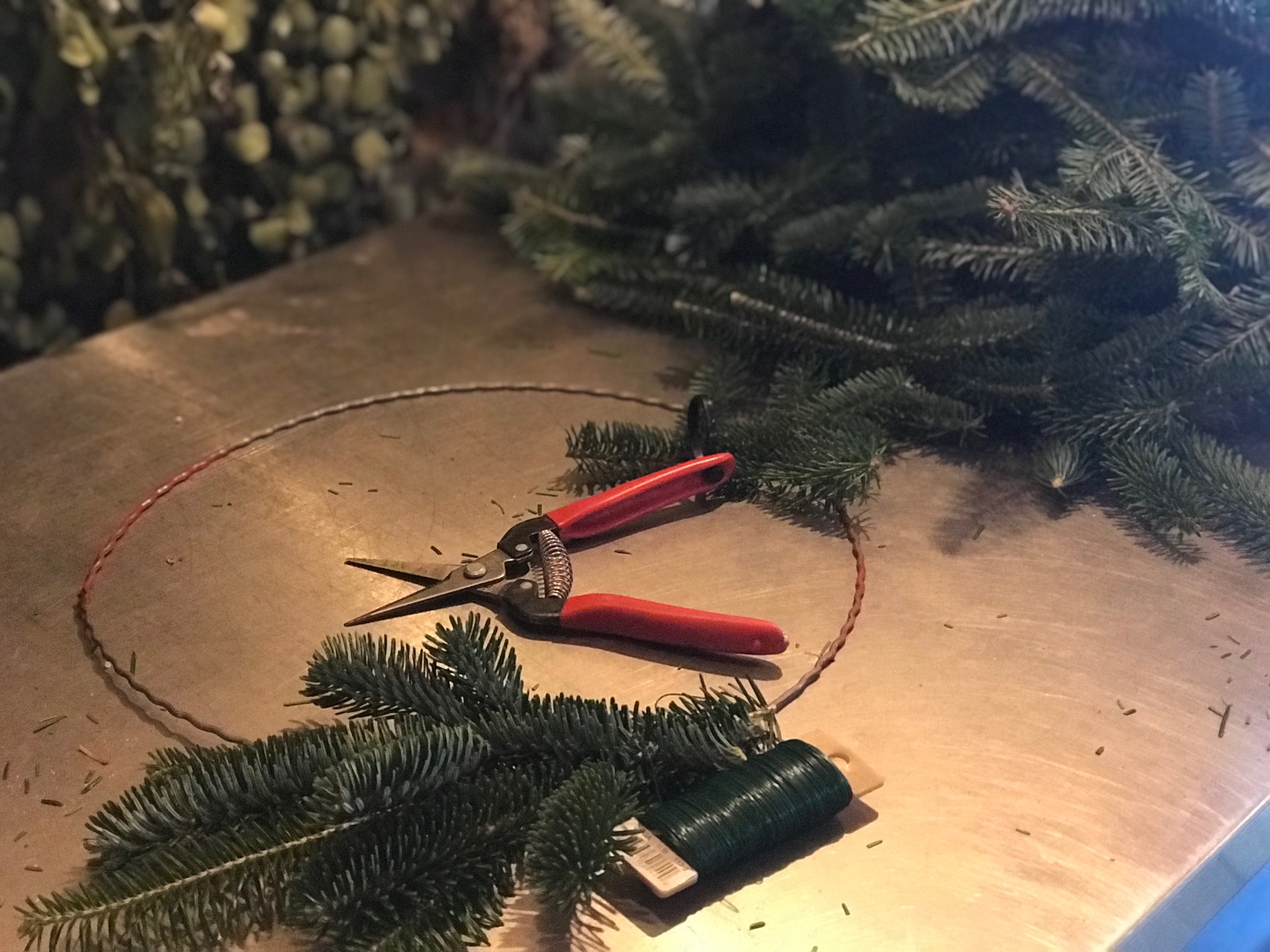 snips, wire and ring; the tools for a wreath workshop