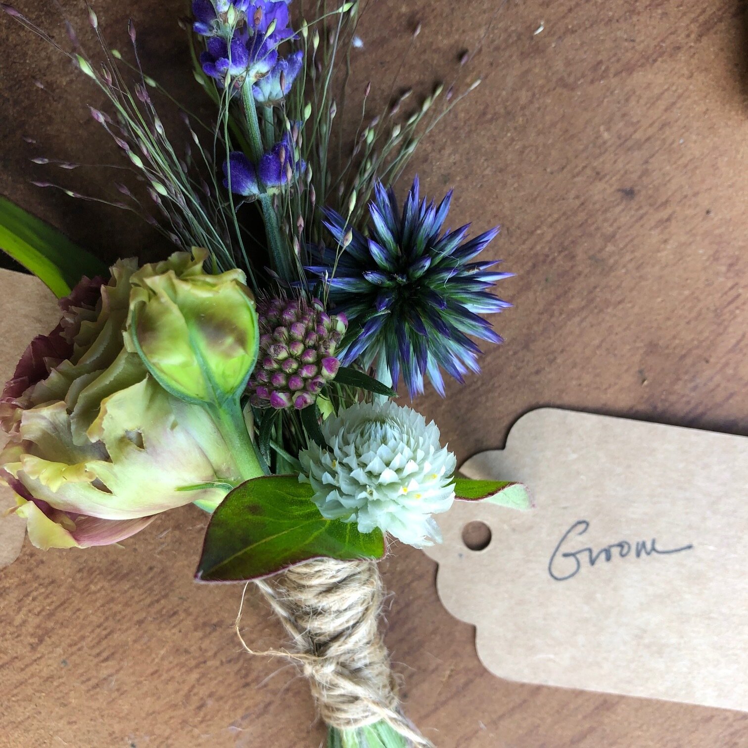 lisianthus and echinops lavender boutonniere