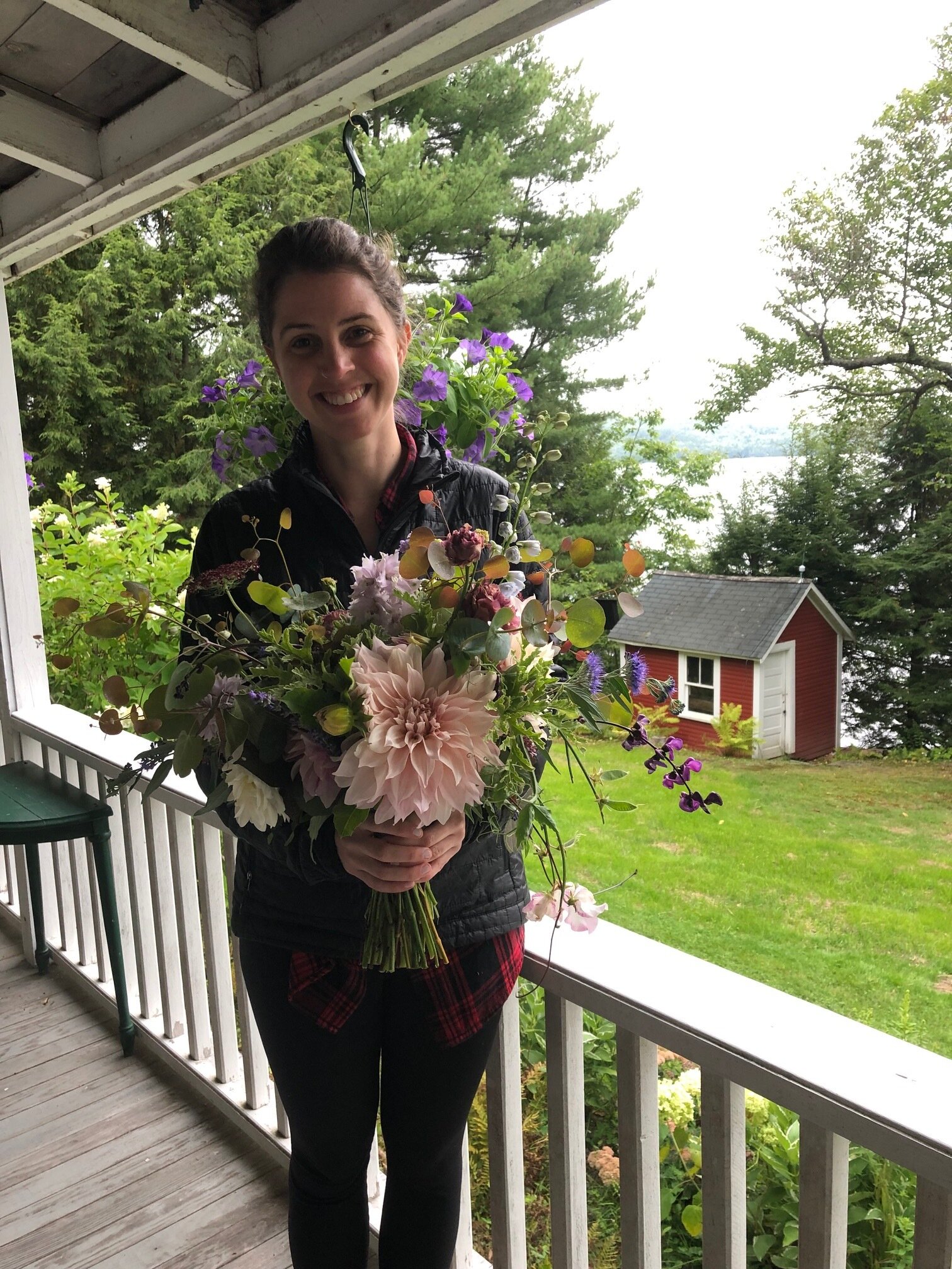 happy bride with lavender and cream bouquet