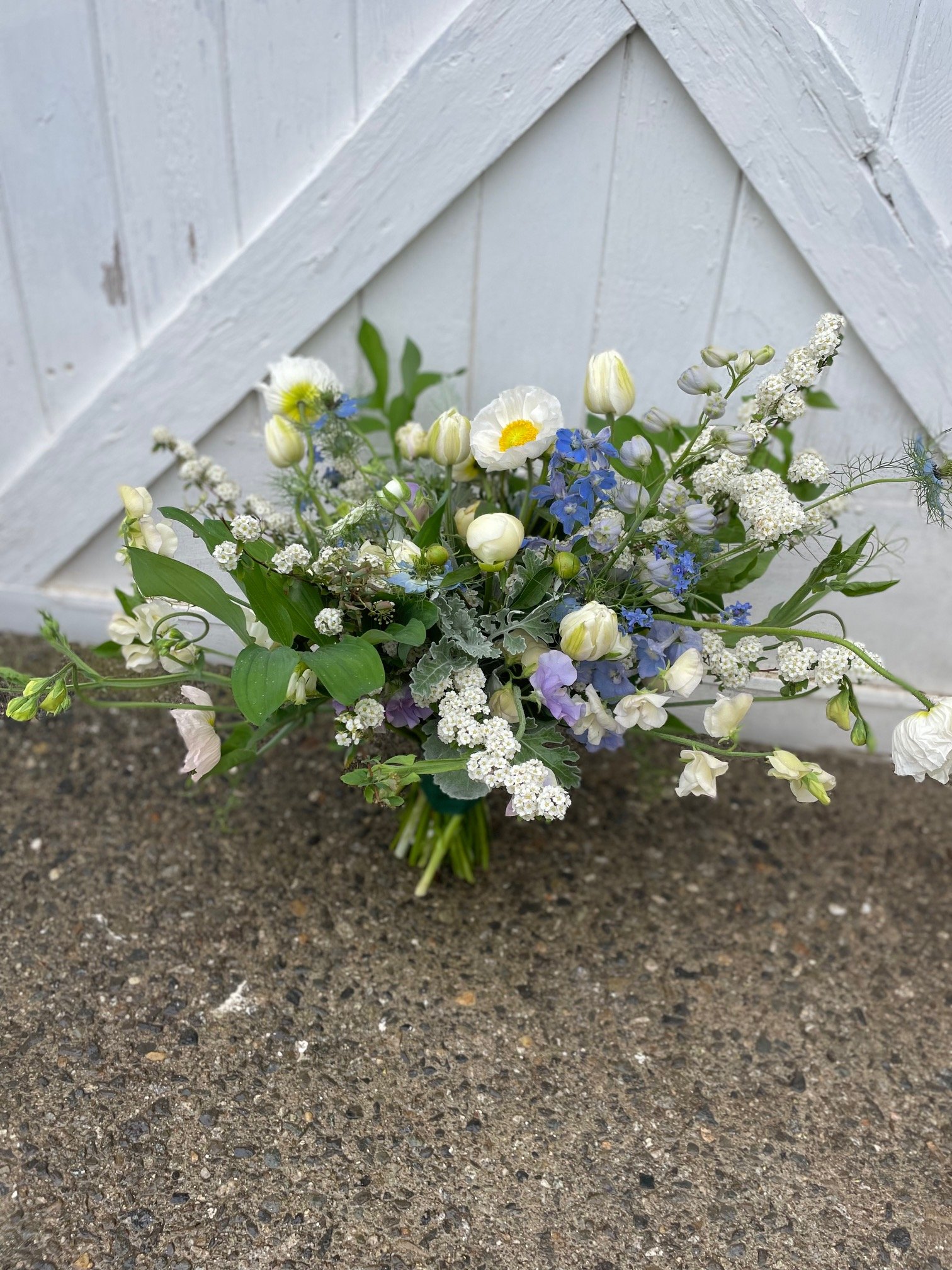 white and blue bridal bouquet