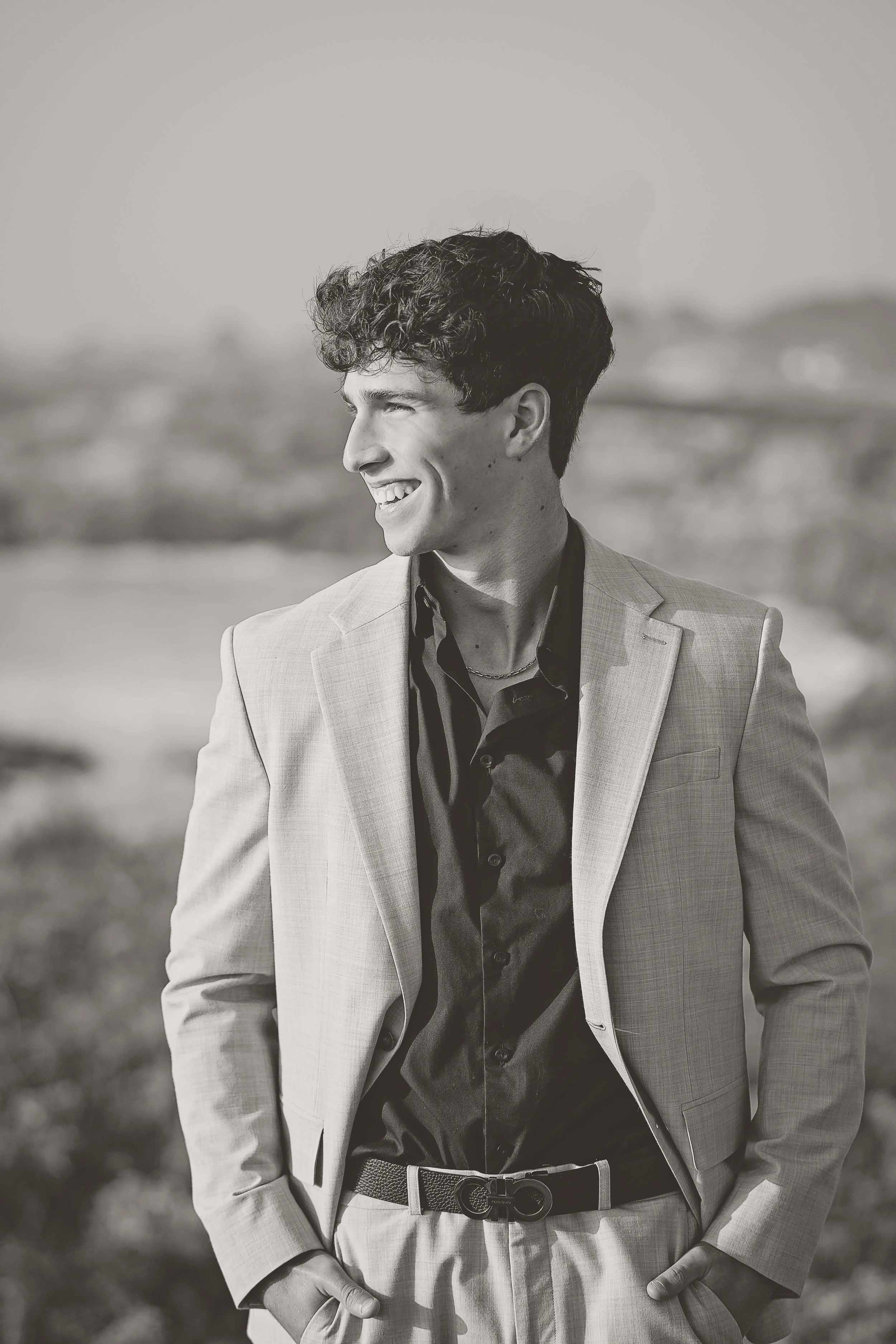 Senior Portraits in a suit at the beach in Monterey, CA