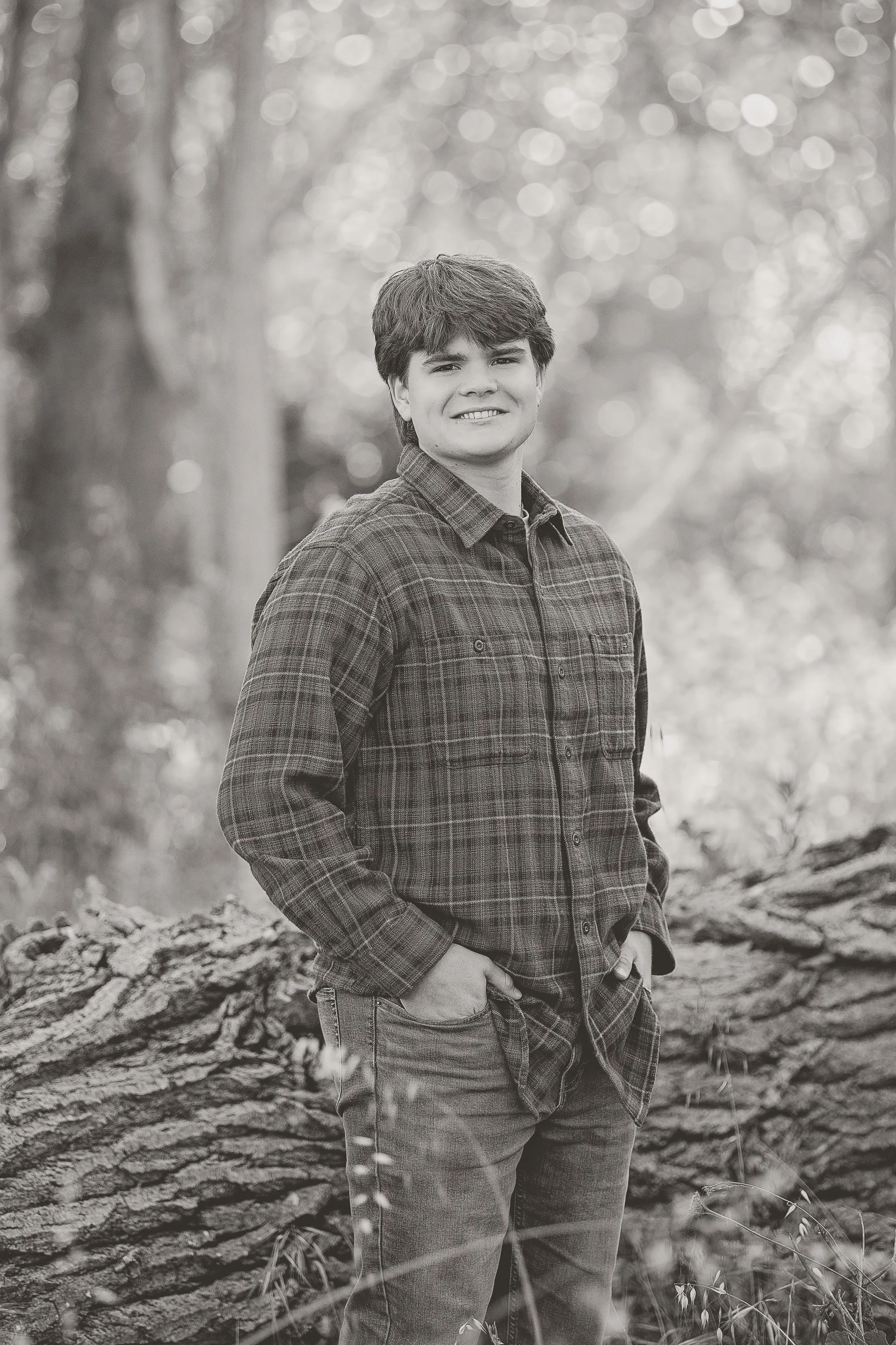 Black and white senior portrait of Salinas High School graduate Gianni at Garland Ranch in Carmel Valley.