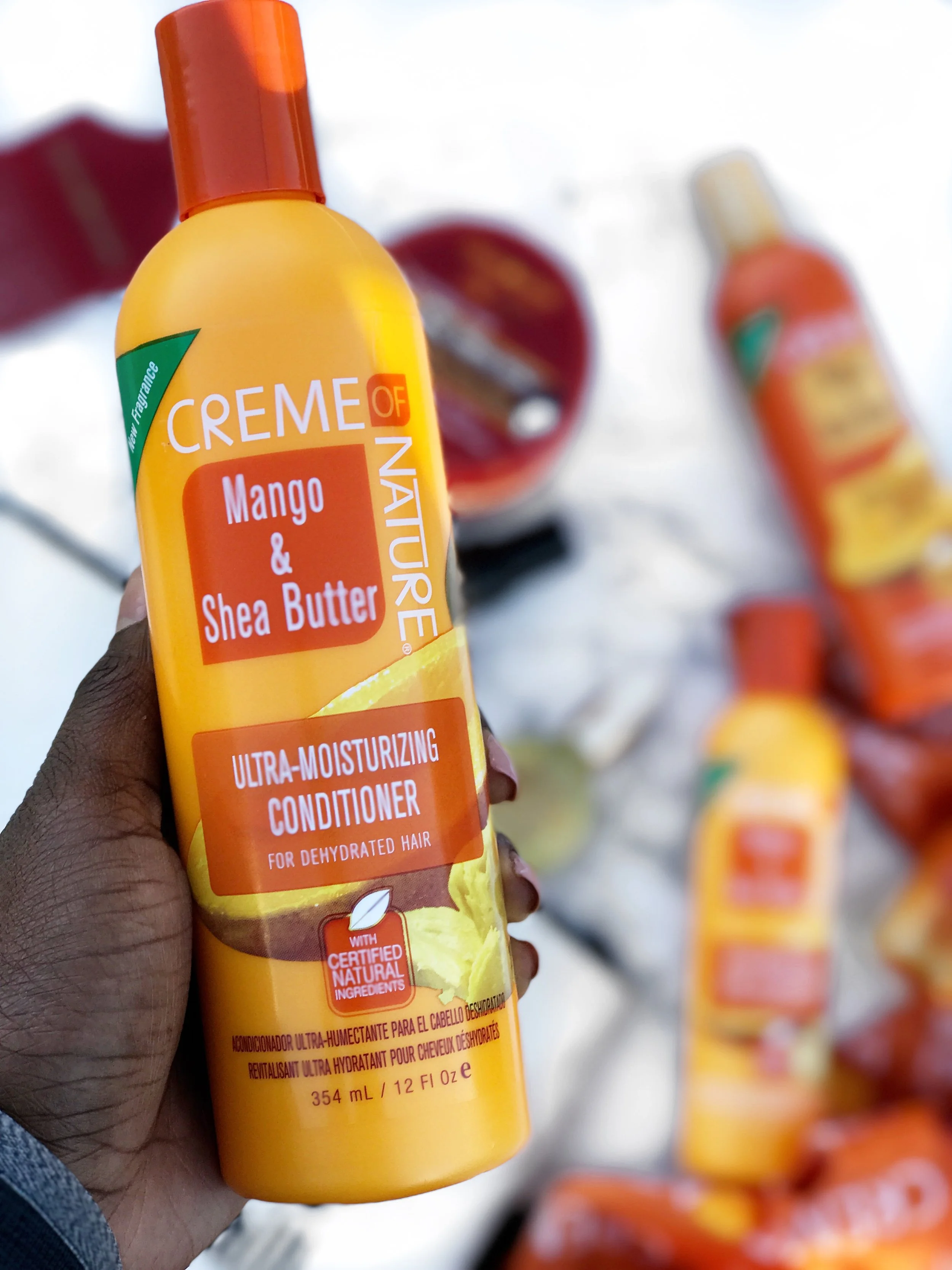HOW I AM KEEPING MY HAIR HEALTHY- MY FAVORITE CREME OF  NATURE CONDITIONERS