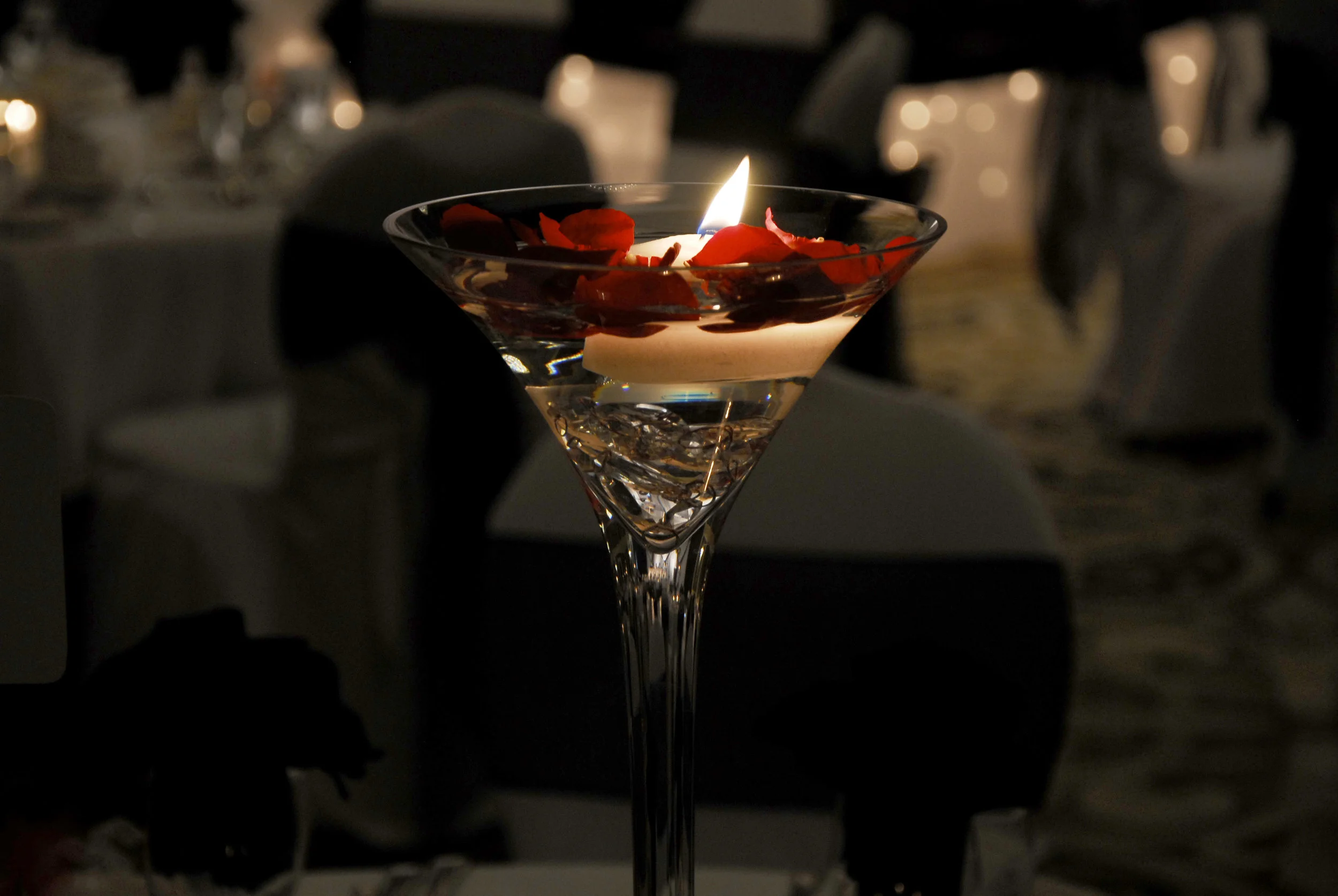 Martini vase with petals and candles.JPG