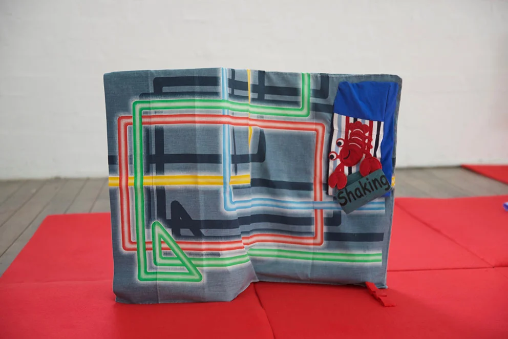 Why are you (shaking) ? Pillowcase, deconstructed t-shirt, magnets, aluminium, polyester wadding, polar fleece, quick release buckle. Victorian College of the Arts, Melbourne July, 2017