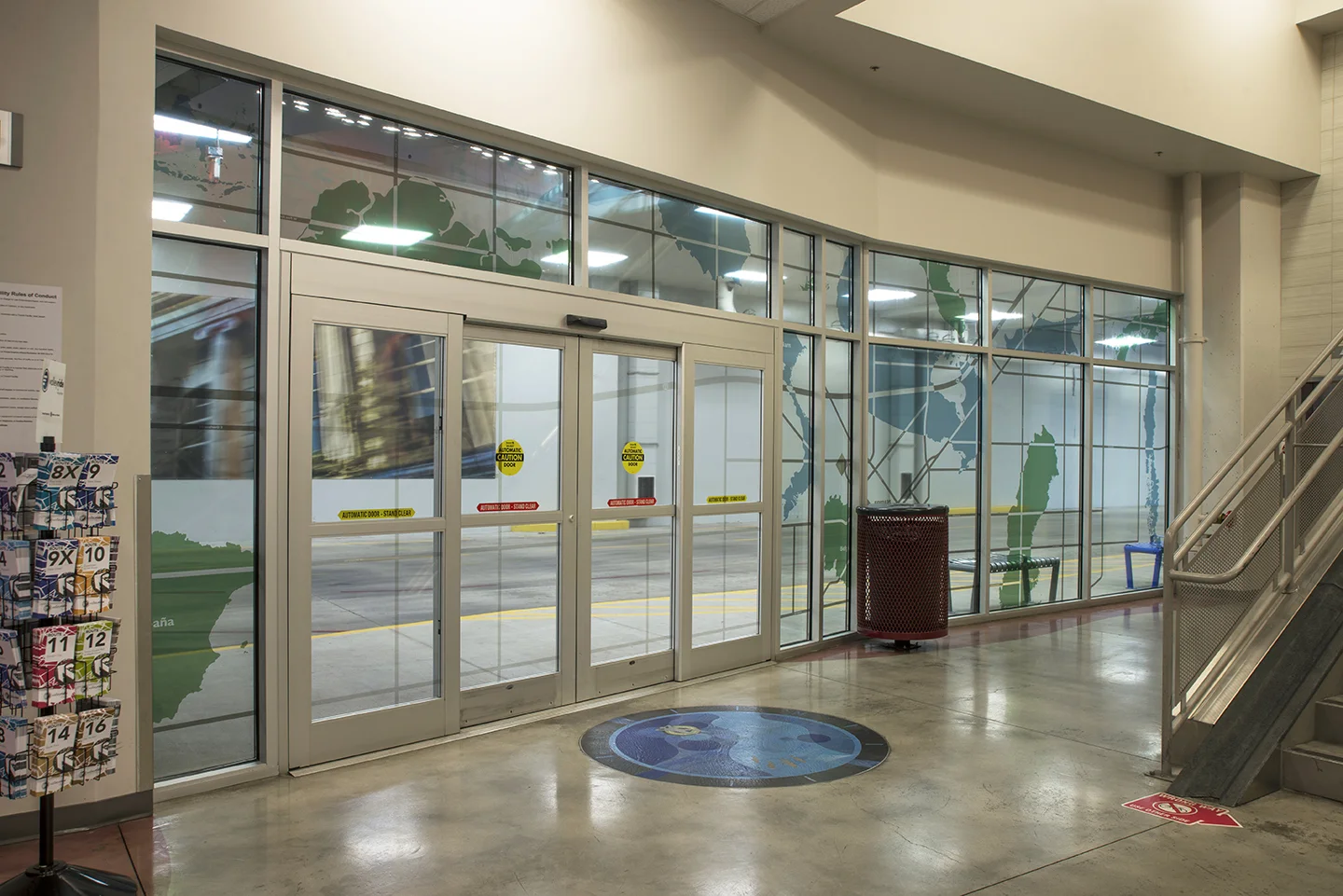 "The Commute: Idaho: Imports & Exports" vinyl on windows, Valley Regional Transit Station, Boise, Idaho, 2018