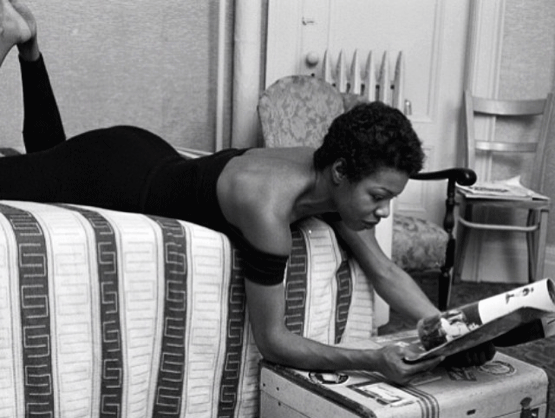 Maya Angelou reading in her dressing room at The Village Vanguard in NYC Photo by G. Marshall Wilson