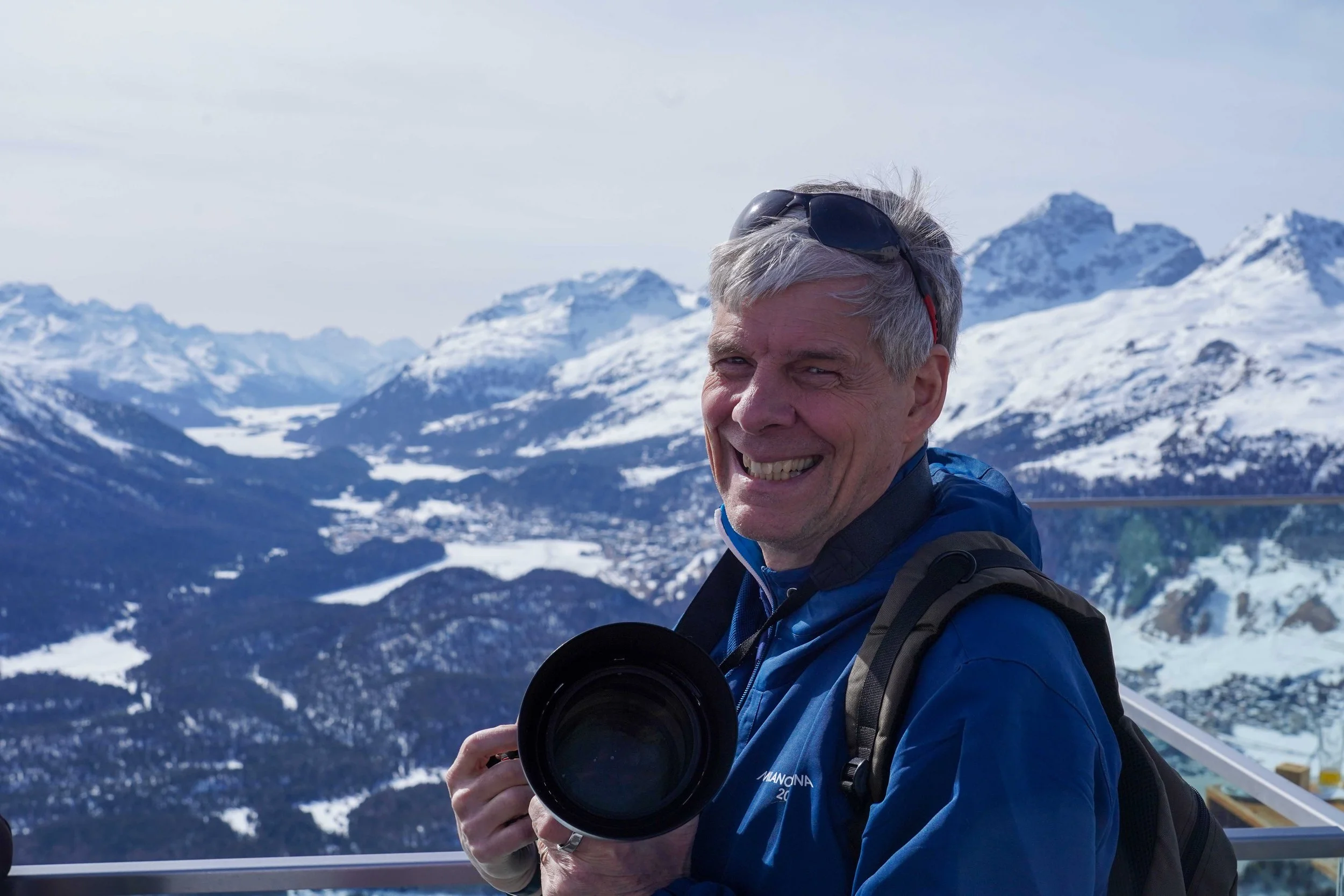 Gunnar Knapp enjoying panoramic views over the Engadin Valley at Muottas Muragl