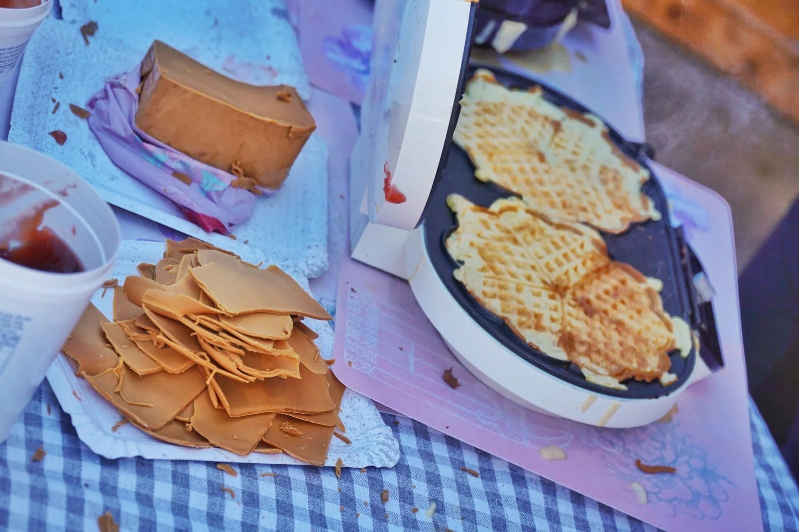 Stacks of gjetost, brown Norwegian goat cheese and heart-shaped waffles await hungry skiers.