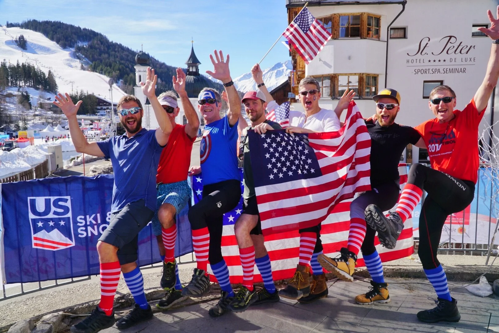 Guests dress the part to cheer on the women’s relay team with fresh face paint and relay socks.
