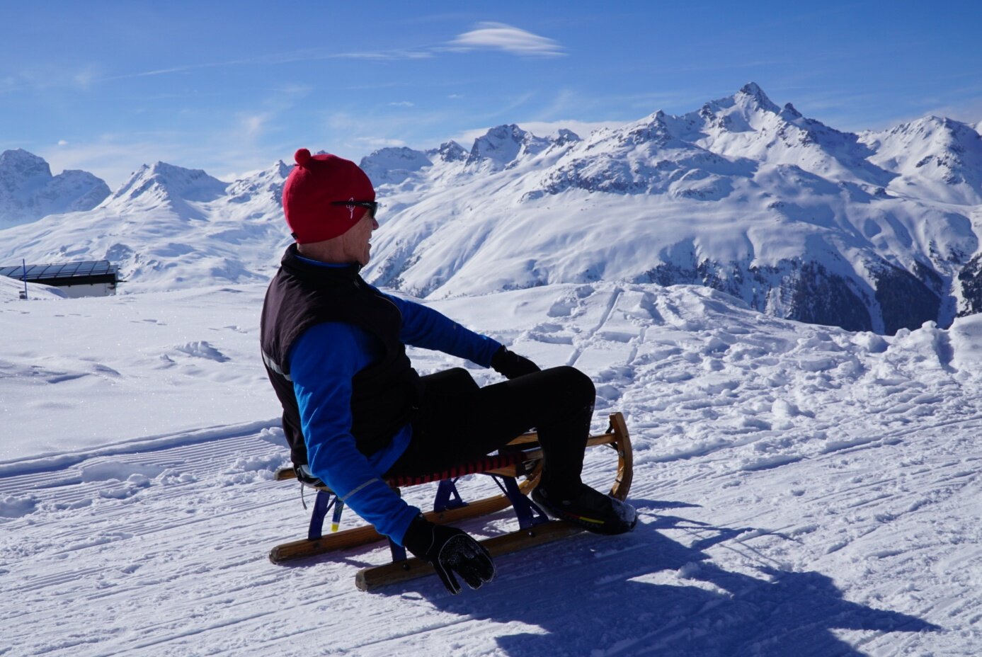 Funicular ride and sledding overlooking St Moritz