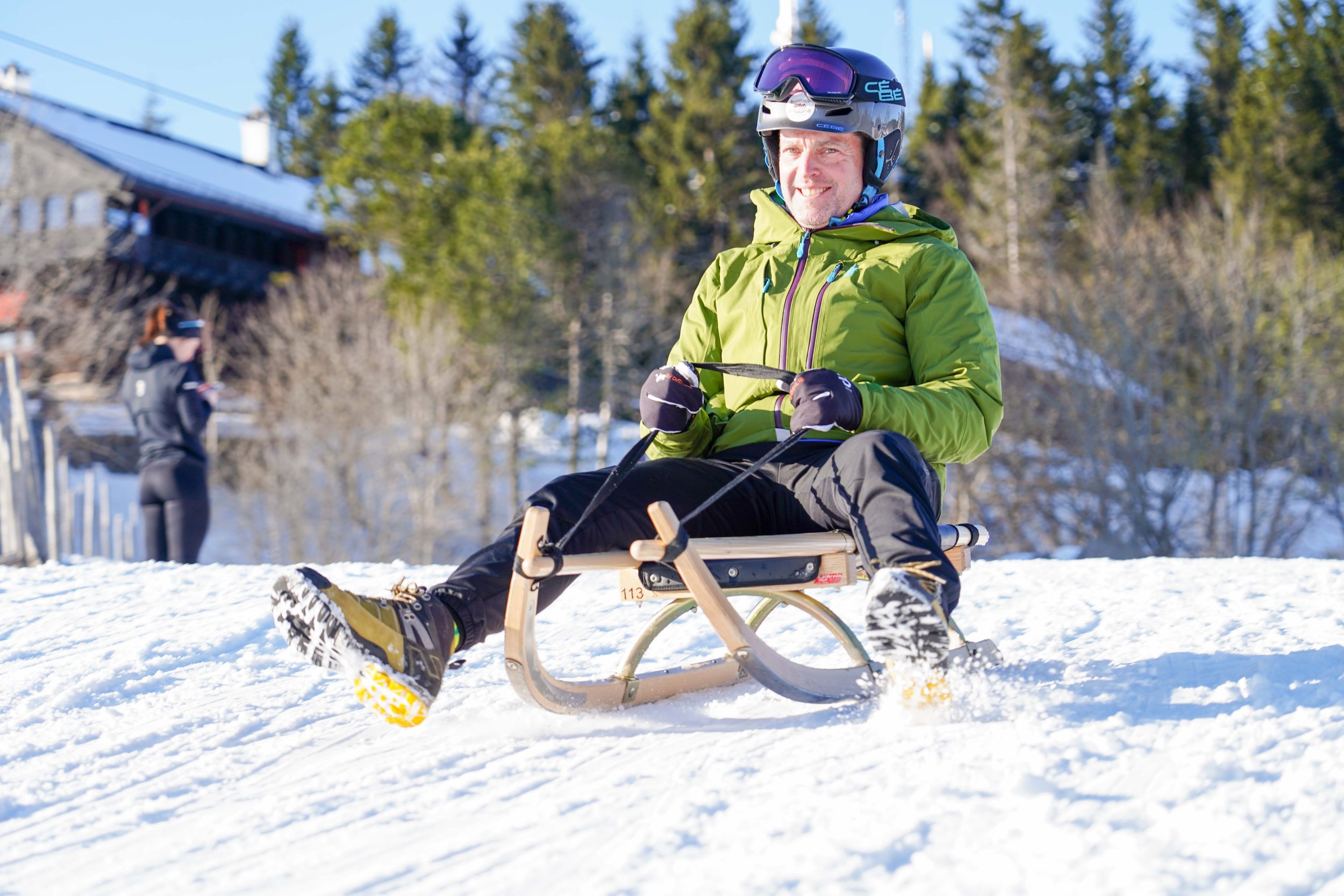 Sledding down the Korketrekkeren trail