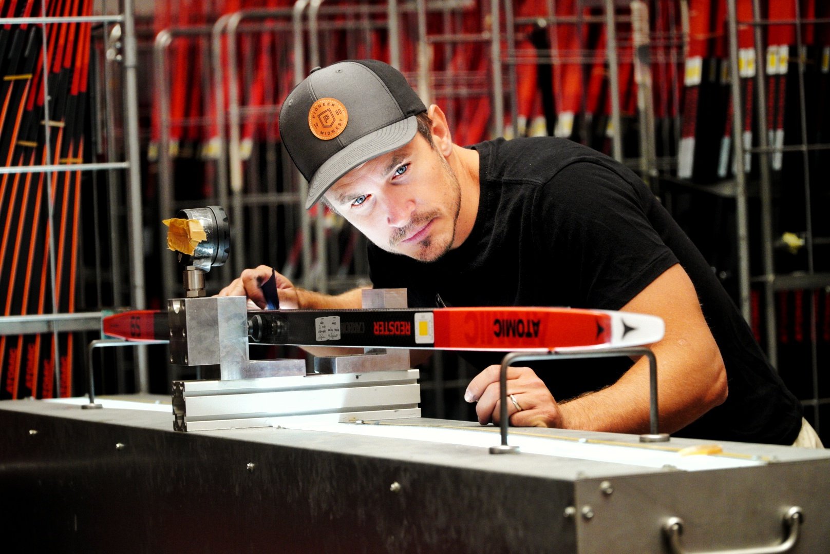 Matt Liebsch testing skis inside the Atomic factory during production and quality checks.