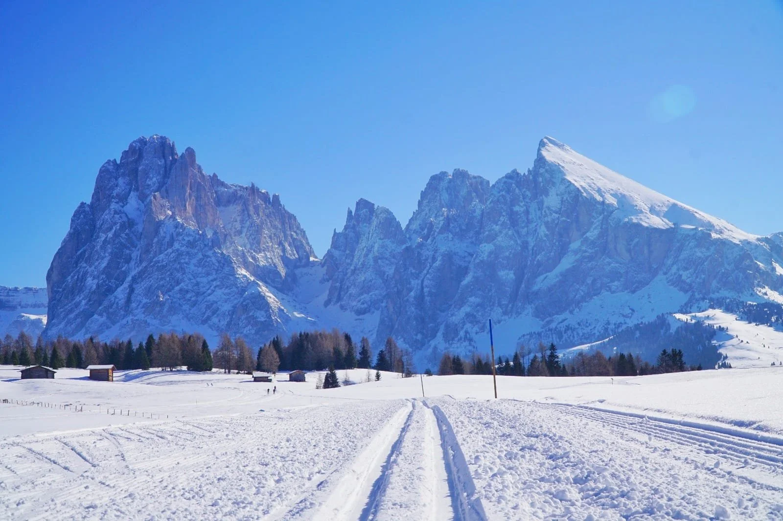 cross-country ski tracks below the snowy dolomites, best places to cross-country ski in the world