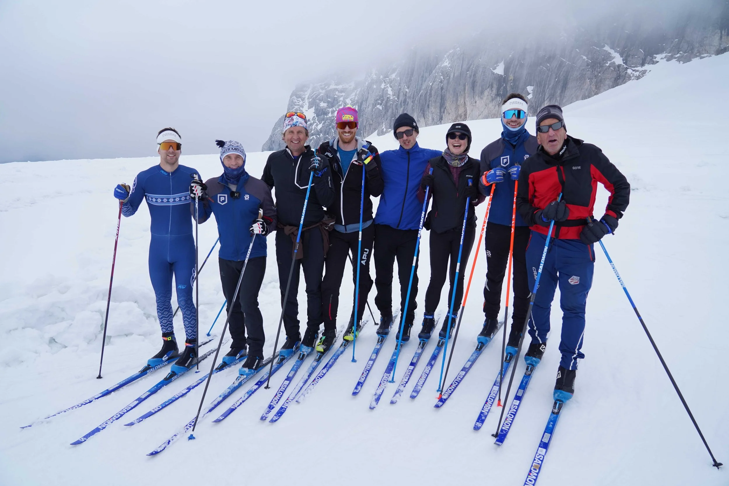Skiing on a glacier in spring conditions with wide alpine terrain