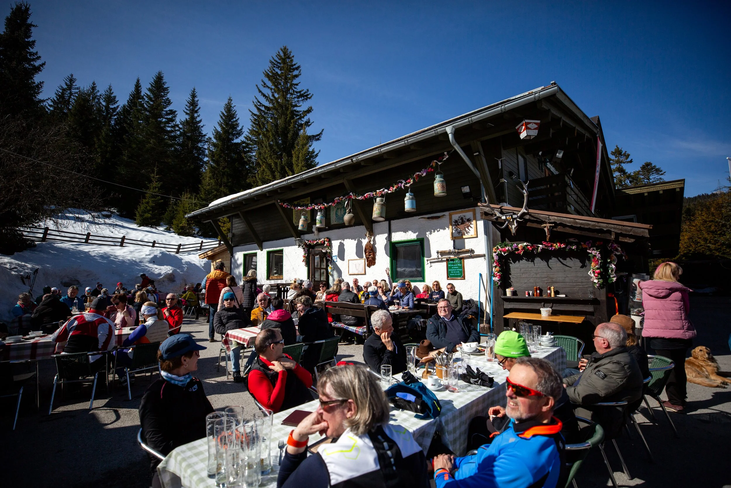 A cozy Wildmoos hut welcoming skiers along the peaceful cross-country trails