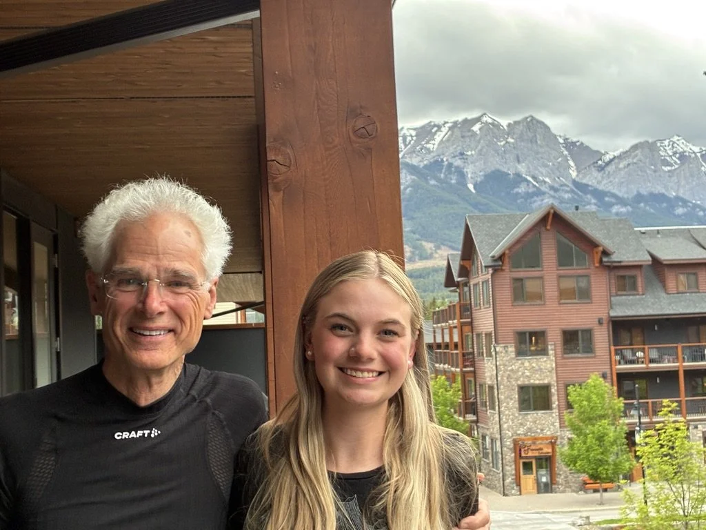 A friendly group photo with Lumi social media manager Anna during a visit to the snowy trails in Canmore.
