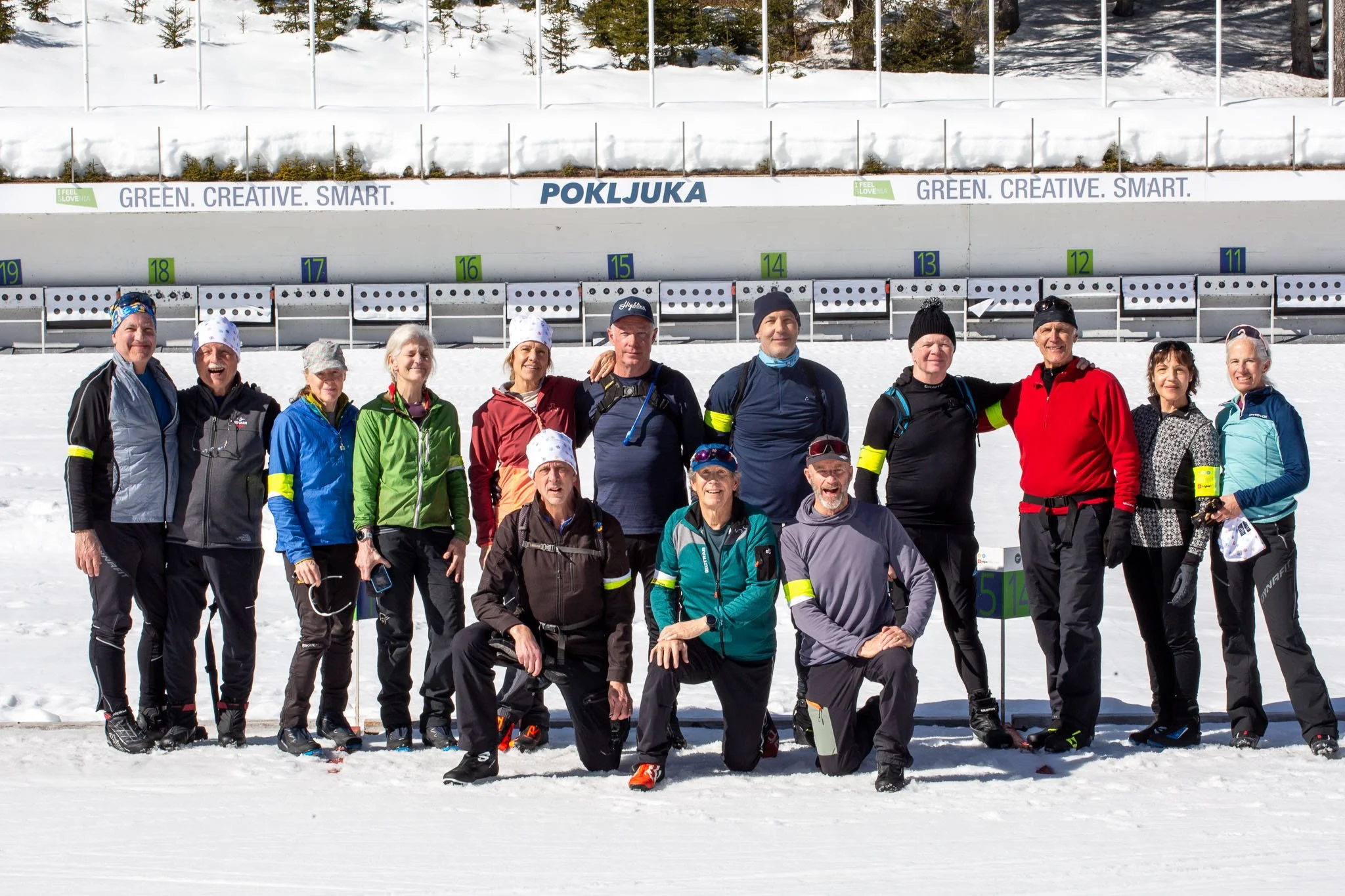 Lumi trip guests trying out biathlon target shooting together on the world-class cross-country ski trails in Slovenia