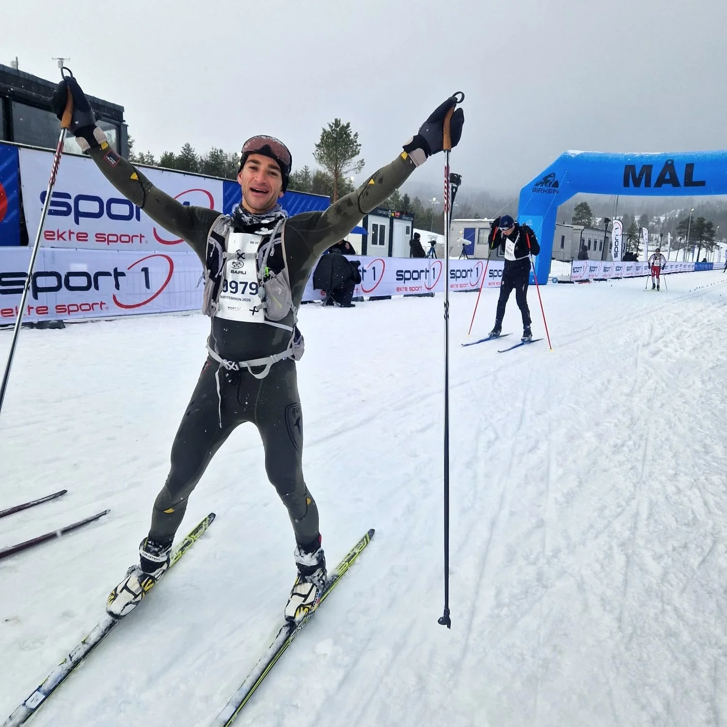 Evan celebrates his achievement after completing the 54 km SkøyteBirken in Norway