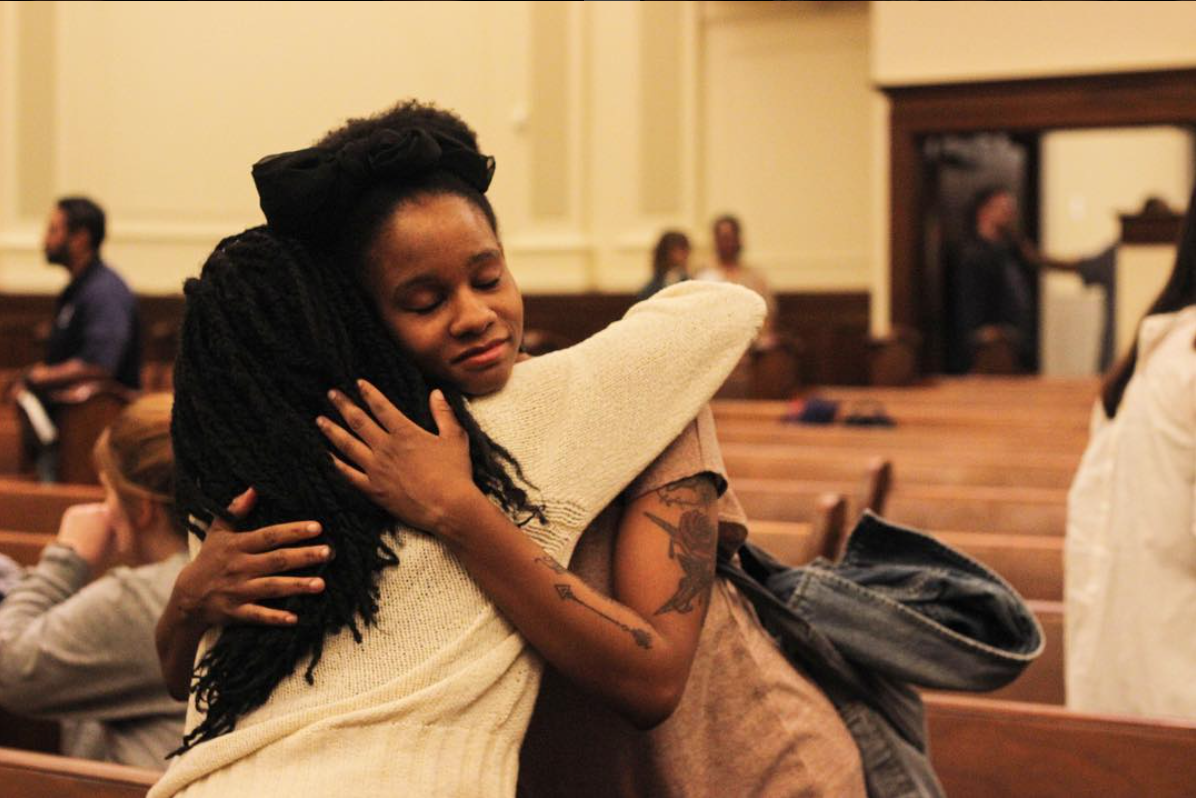 Two CAYA ladies hugging