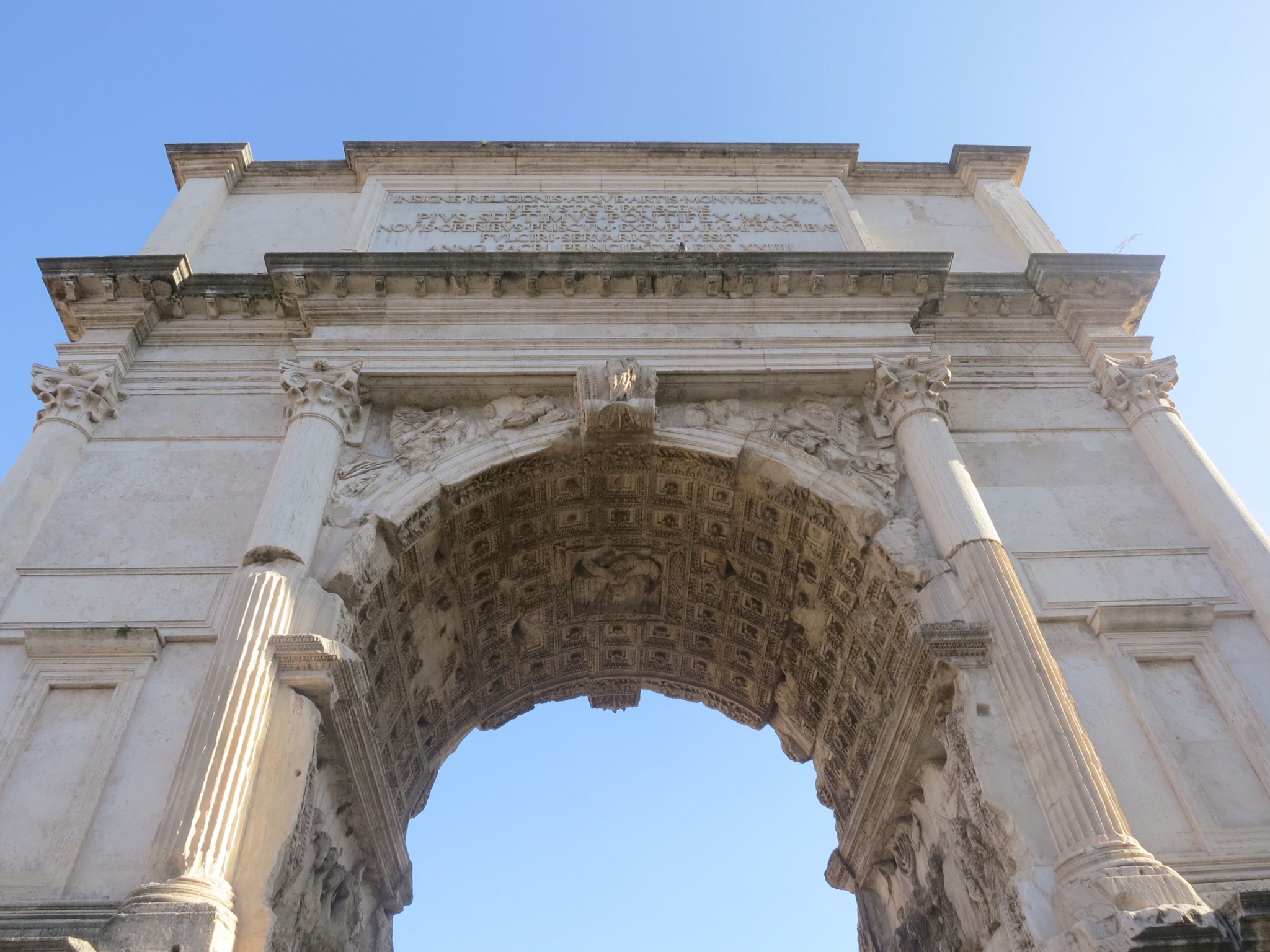 The Arch of Titus has detailed relief inside depicting the spoils of Jerusalem.Roman Forum, Rome, Italy.