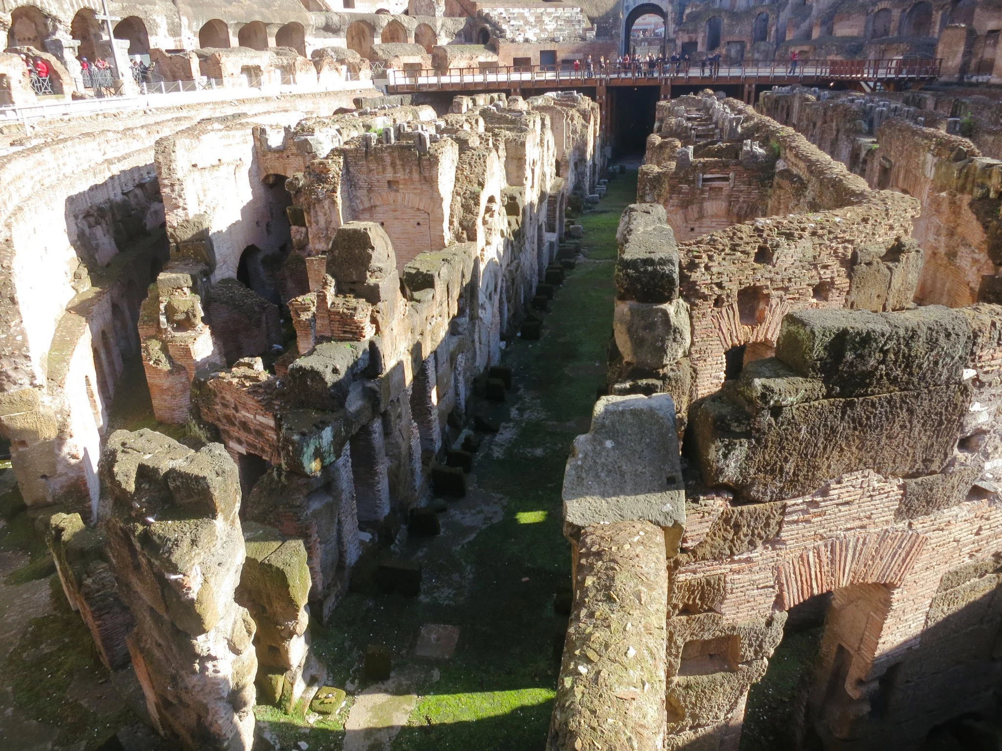 What it feels like to stare into the labyrinth of tunnels and doorways beneath the floor of hte Colosseum in Rome, Italy.