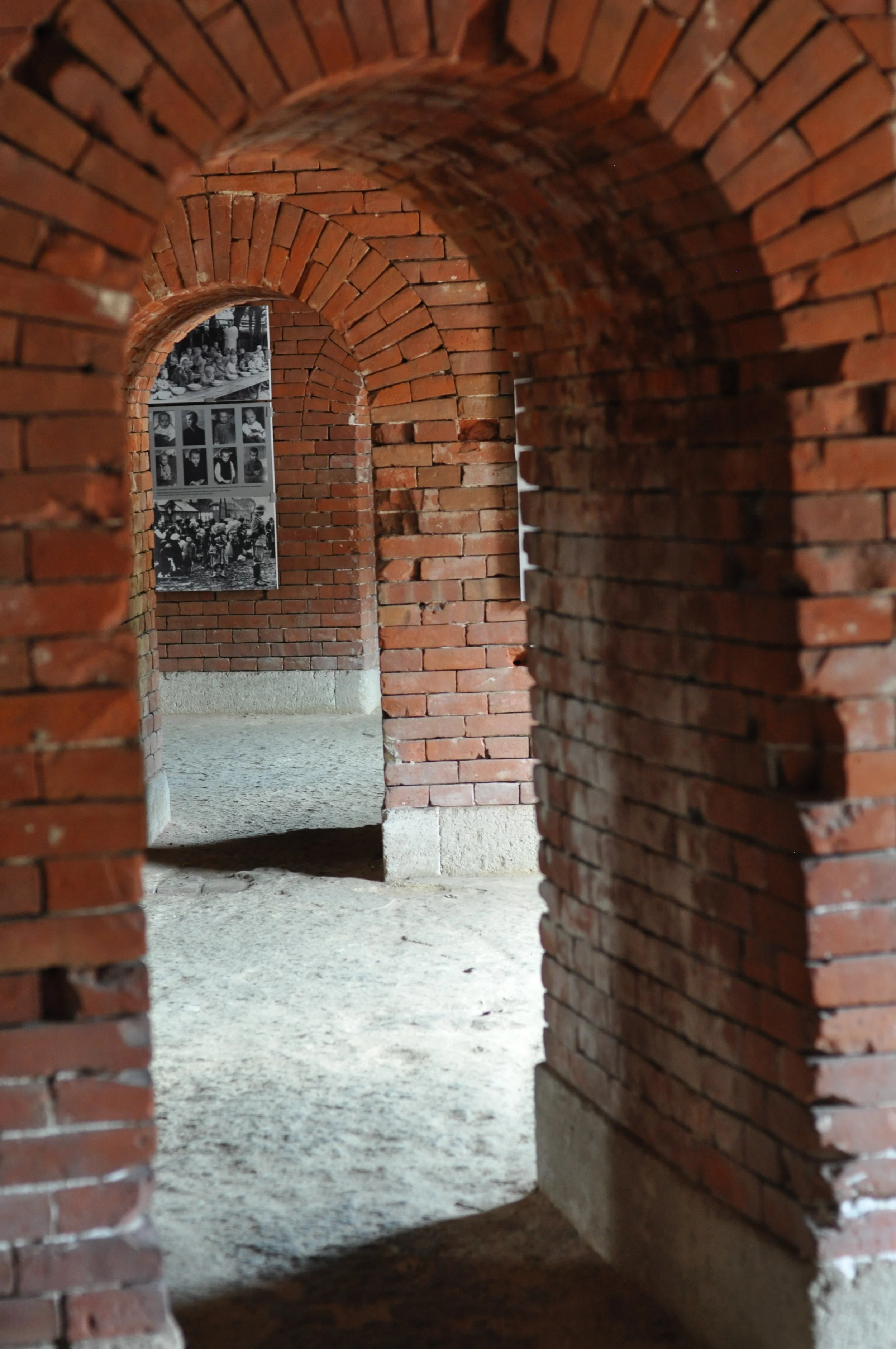 Looking through the cells in the Rotunda in Zamosc, Poland